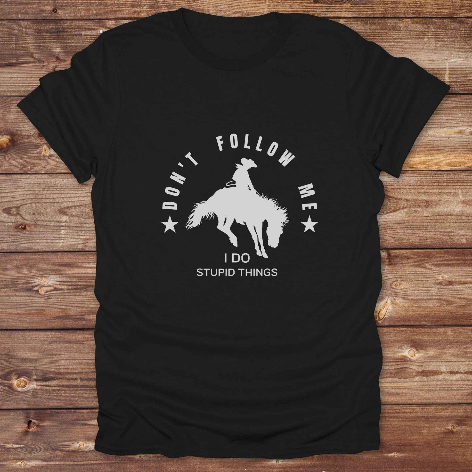 Fun western t-shirt for horse lovers and cowgirls. Western cowgirl graphic tee with horse design. Cowboy humor t-shirt for rodeo and country lovers. Horse lover funny t-shirt with western theme. Country style horse graphic tee for cowboys and cowgirls. Retro style funny western shirt for equestrians. Cute and funny country shirt with horse print. Southern cowgirl funny quote shirt for horse lovers. Dont follow me I do stupid things.