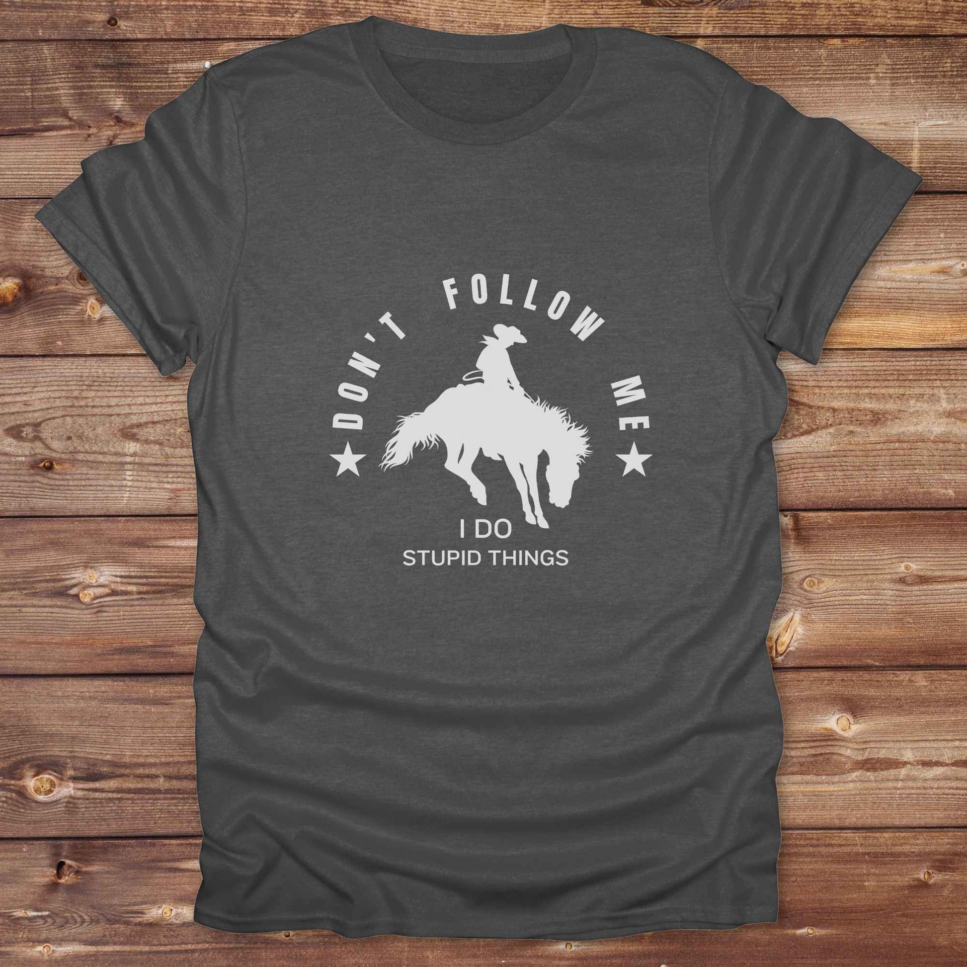 Fun western t-shirt for horse lovers and cowgirls. Western cowgirl graphic tee with horse design. Cowboy humor t-shirt for rodeo and country lovers. Horse lover funny t-shirt with western theme. Country style horse graphic tee for cowboys and cowgirls. Retro style funny western shirt for equestrians. Cute and funny country shirt with horse print. Southern cowgirl funny quote shirt for horse lovers. Dont follow me I do stupid things.