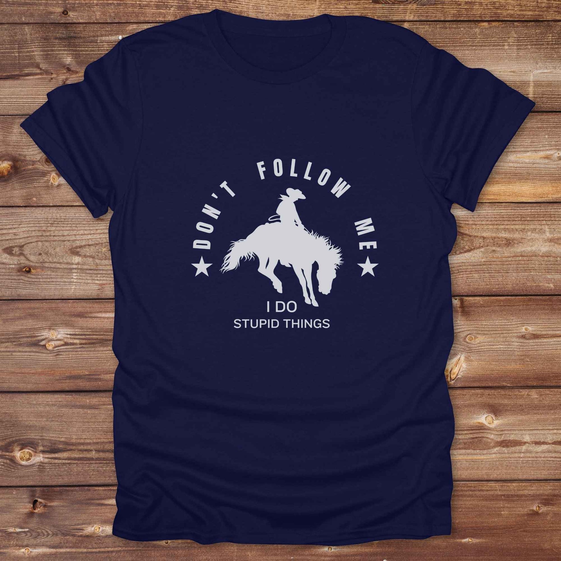 Fun western t-shirt for horse lovers and cowgirls. Western cowgirl graphic tee with horse design. Cowboy humor t-shirt for rodeo and country lovers. Horse lover funny t-shirt with western theme. Country style horse graphic tee for cowboys and cowgirls. Retro style funny western shirt for equestrians. Cute and funny country shirt with horse print. Southern cowgirl funny quote shirt for horse lovers. Dont follow me I do stupid things.