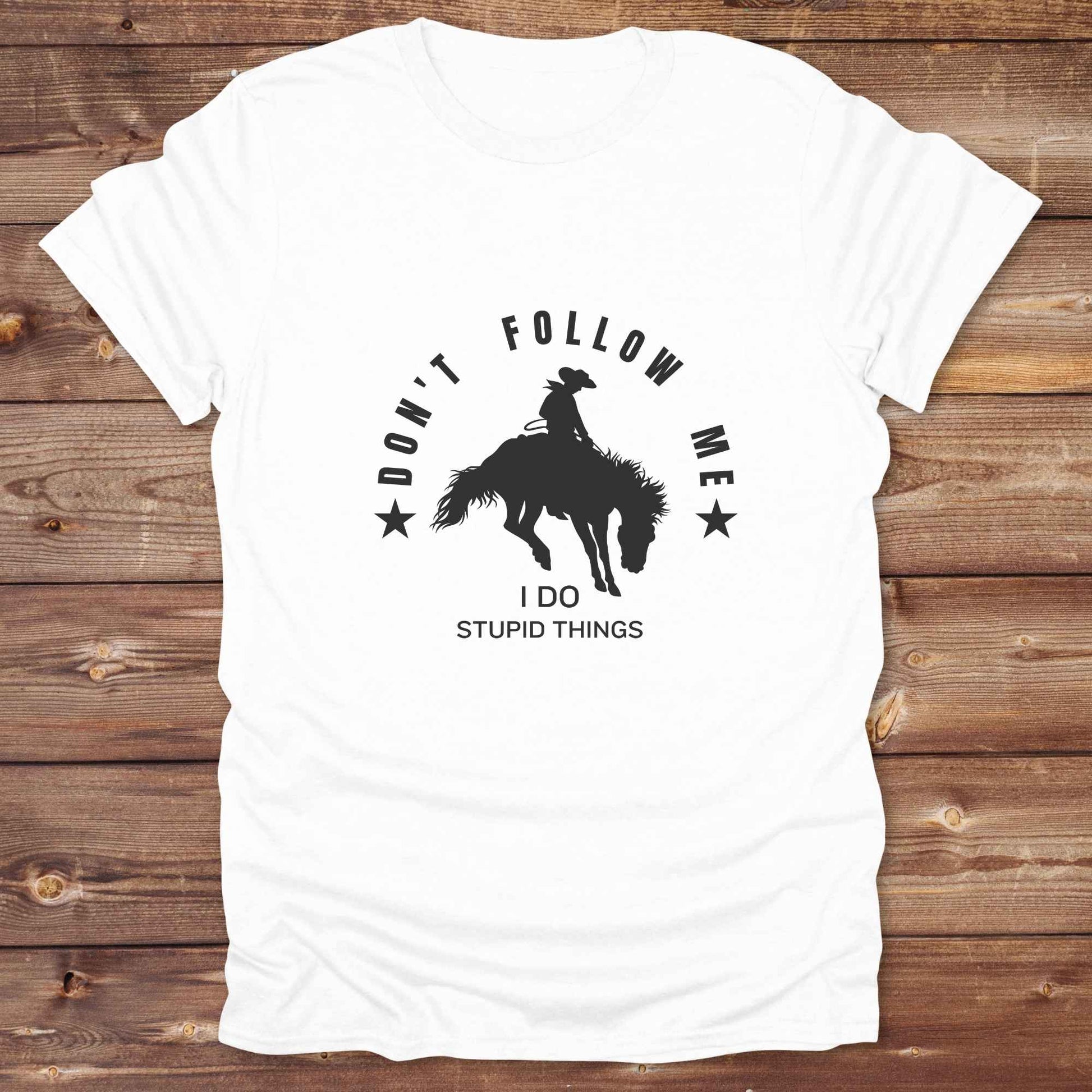 Fun western t-shirt for horse lovers and cowgirls. Western cowgirl graphic tee with horse design. Cowboy humor t-shirt for rodeo and country lovers. Horse lover funny t-shirt with western theme. Country style horse graphic tee for cowboys and cowgirls. Retro style funny western shirt for equestrians. Cute and funny country shirt with horse print. Southern cowgirl funny quote shirt for horse lovers. Dont follow me I do stupid things.