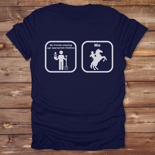 Fun western t-shirt for horse lovers and cowgirls. Western cowgirl graphic tee with horse design. Cowboy humor t-shirt for rodeo and country lovers. Horse lover funny t-shirt with western theme. Country style horse graphic tee for cowboys and cowgirls. Retro style funny western shirt for equestrians. Cute and funny country shirt with horse print. Southern cowgirl funny quote shirt for horse lovers. Age appropriate hobbies.