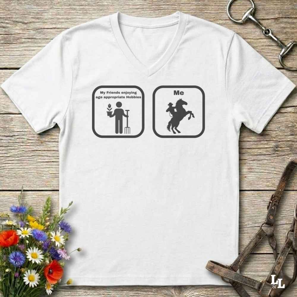 white V-neck tee with Age Appropriate Design on the front