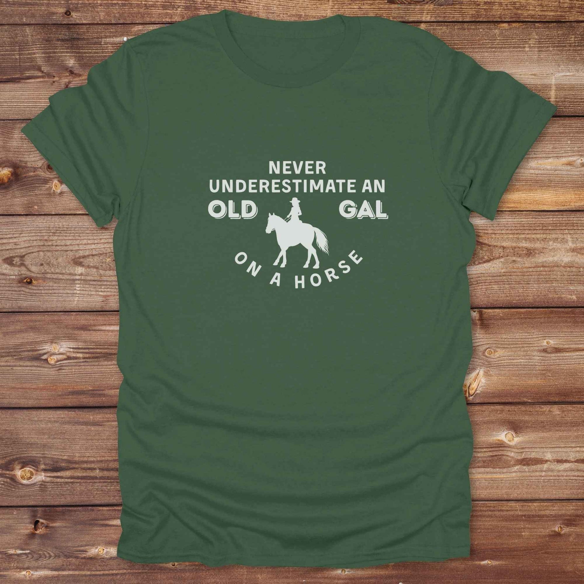 Fun western t-shirt for horse lovers and cowgirls. Western cowgirl graphic tee with horse design. Cowboy humor t-shirt for rodeo and country lovers. Horse lover funny t-shirt with western theme. Country style horse graphic tee for cowboys and cowgirls. Retro style funny western shirt for equestrians. Cute and funny country shirt with horse print. Southern cowgirl funny quote shirt for horse lovers. Never underestimate an old gal on a horse.