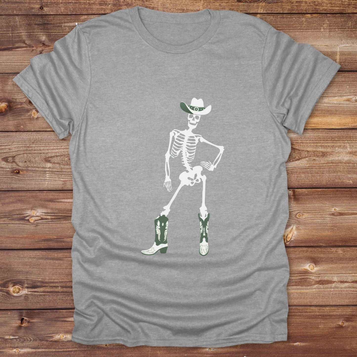 Cowgirl Skeleton T-Shirt is your ultimate spooky-season western tee — perfect for cowgirls, rodeo lovers, and horse fans who want to stand out. Featuring a bold white skeleton in cowboy boots and hat, it’s got that wild west attitude with Halloween sass. For gifting a country girl or dressing for a western Halloween, this tee turns heads and boots up sales. Great for cowgirl birthdays, rodeo fans, and those with spooky southern charm.