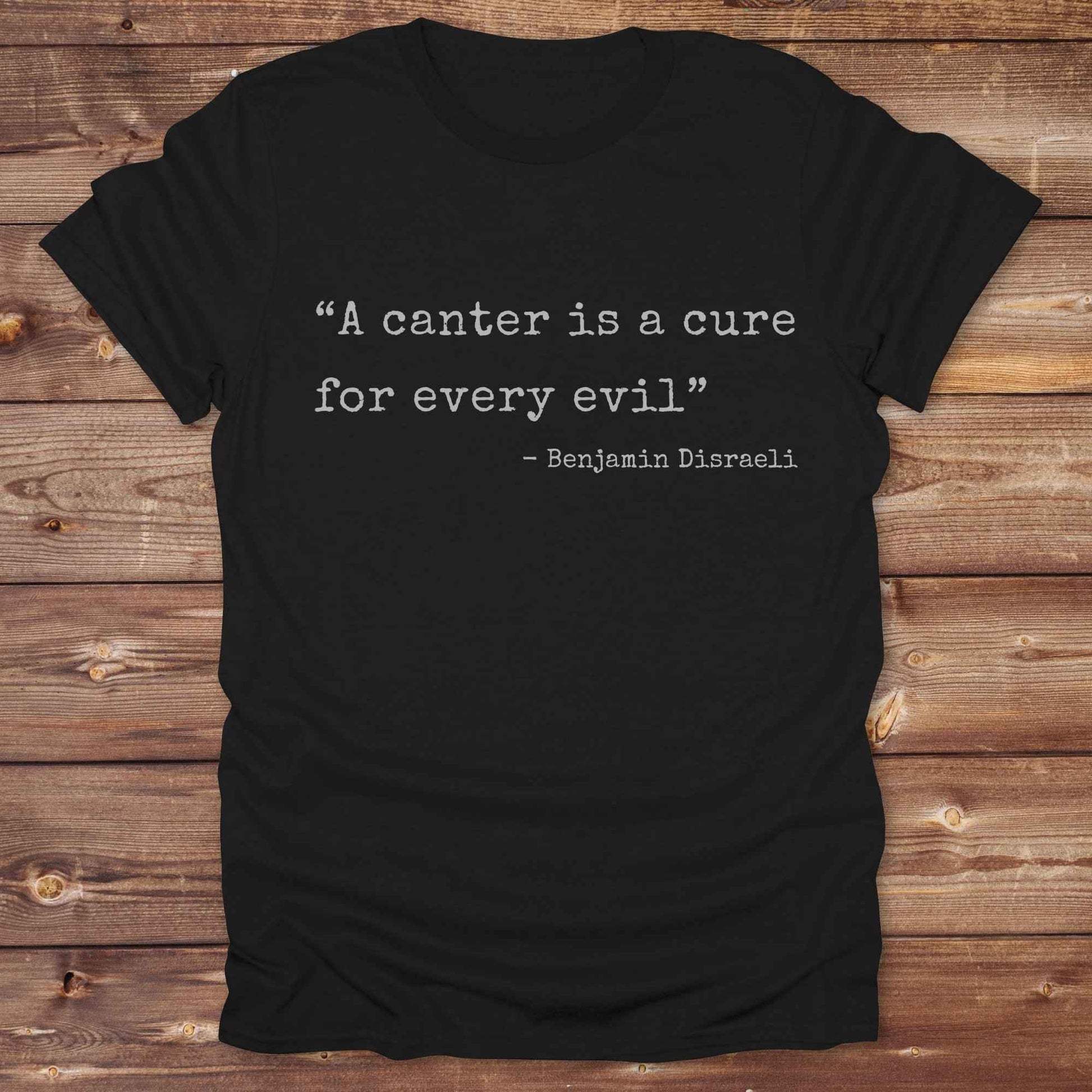 Discover the healing power of riding with our “A canter is a cure for every evil” T‑Shirt featuring a poignant Benjamin Disraeli quote. Designed for equestrians, cowboys, cowgirls, and country fashion lovers. Perfect for barn days, trail rides, and relaxed weekends. the ideal gift and a staple in any horse lover’s wardrobe. Giddy up and shop now!
