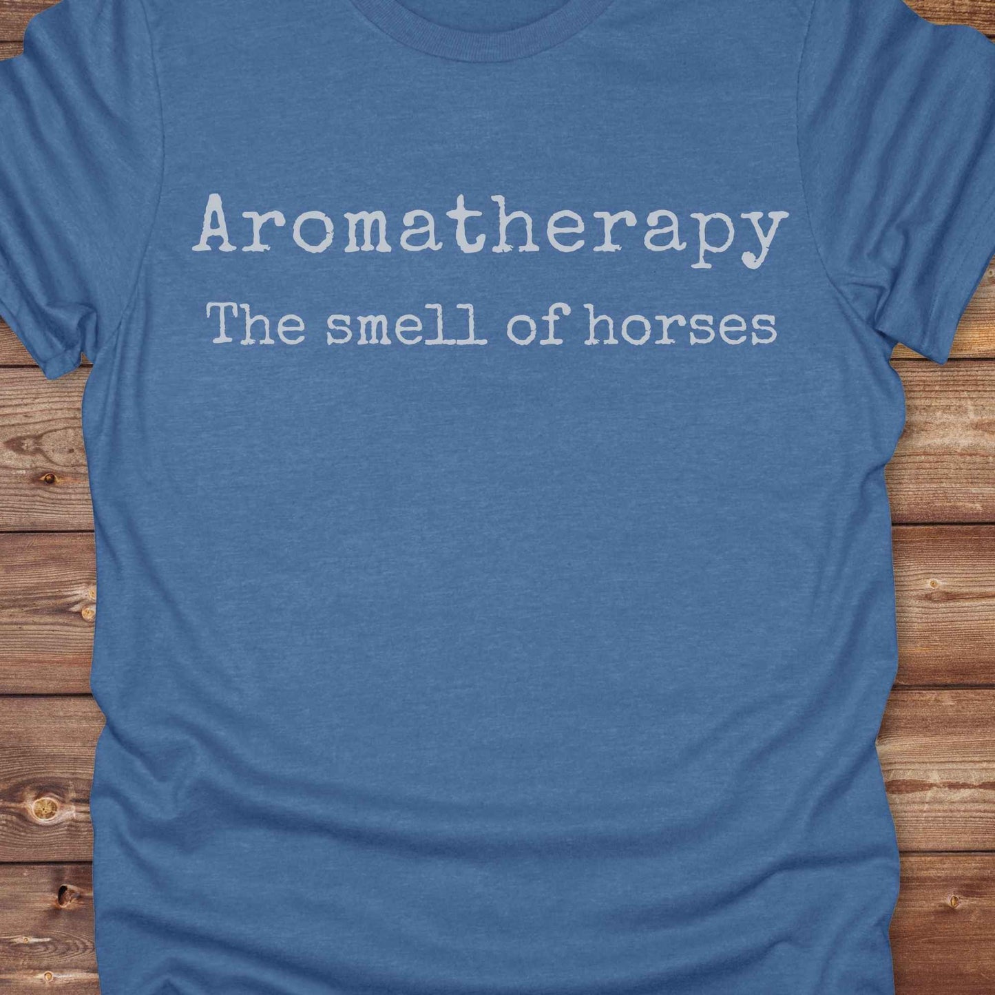 This "Aromatherapy: The Smell of Horses" t-shirt is perfect for cowgirls, horse moms, and equestrian fans who adore the unmistakable barn scent of saddles, hay, and horses. Designed with rustic charm and equine humor, it makes an ideal gift for western lifestyle lovers, riders, or anyone who finds peace in the smell of a stable. Whether it’s for rodeos, barn events, or lounging in the pasture, this tee says what every true horse lover knows.