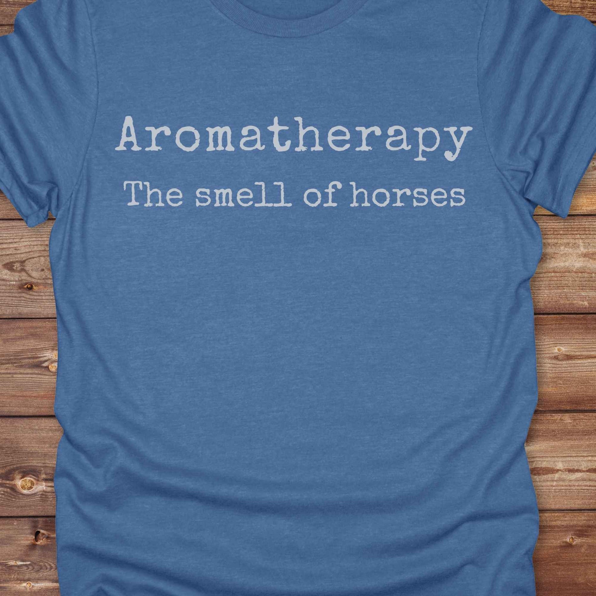 This "Aromatherapy: The Smell of Horses" t-shirt is perfect for cowgirls, horse moms, and equestrian fans who adore the unmistakable barn scent of saddles, hay, and horses. Designed with rustic charm and equine humor, it makes an ideal gift for western lifestyle lovers, riders, or anyone who finds peace in the smell of a stable. Whether it’s for rodeos, barn events, or lounging in the pasture, this tee says what every true horse lover knows.