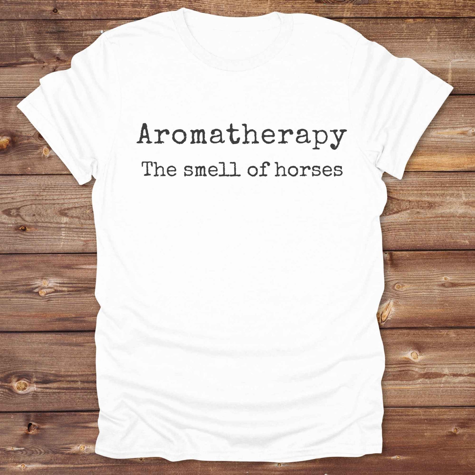 This "Aromatherapy: The Smell of Horses" t-shirt is perfect for cowgirls, horse moms, and equestrian fans who adore the unmistakable barn scent of saddles, hay, and horses. Designed with rustic charm and equine humor, it makes an ideal gift for western lifestyle lovers, riders, or anyone who finds peace in the smell of a stable. Whether it’s for rodeos, barn events, or lounging in the pasture, this tee says what every true horse lover knows.