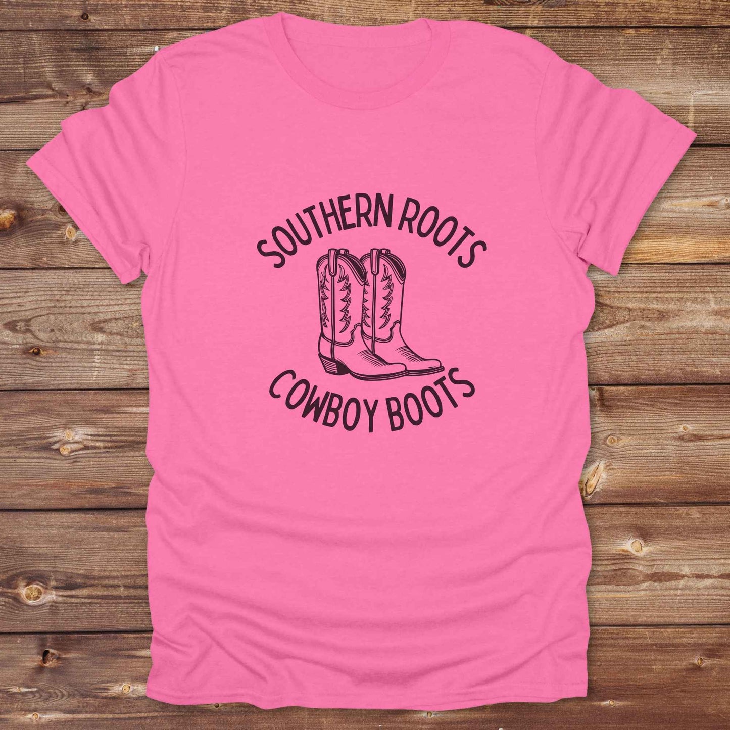 Celebrate your country soul with our “Southern Roots Cowboy Boots” graphic tee perfect for cowgirls, rodeo lovers, and anyone who lives for barn life and western fashion. Featuring bold western typography and iconic cowboy boots artwork, this shirt is a must have for horse lovers and southern style fans alike. Ideal for gifts, rodeo events, or everyday rustic living, it’s designed for comfort, style, and soul. Whether you're headed to the stables, the saloon, or Sunday brunch on the farm.