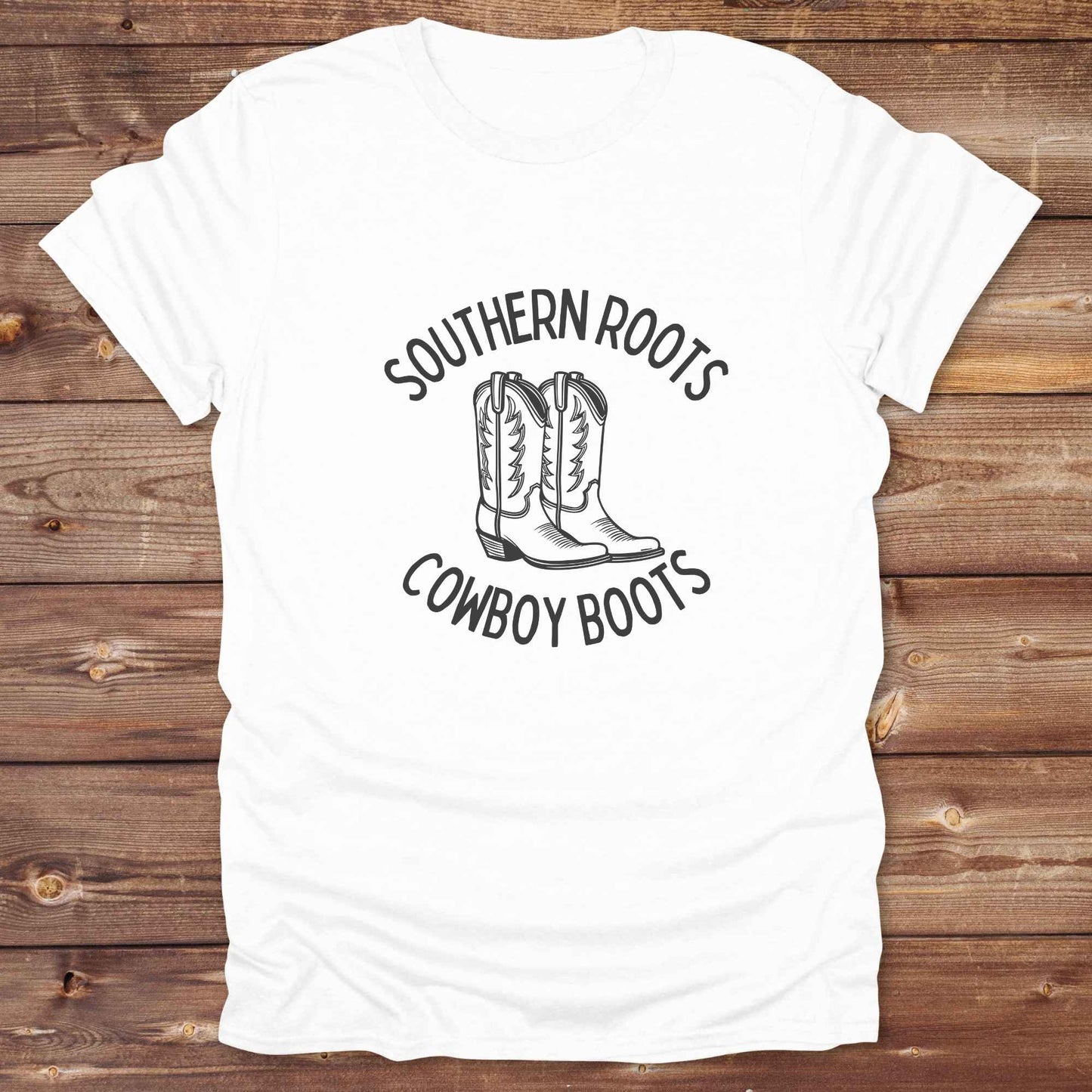 Celebrate your country soul with our “Southern Roots Cowboy Boots” graphic tee perfect for cowgirls, rodeo lovers, and anyone who lives for barn life and western fashion. Featuring bold western typography and iconic cowboy boots artwork, this shirt is a must have for horse lovers and southern style fans alike. Ideal for gifts, rodeo events, or everyday rustic living, it’s designed for comfort, style, and soul. Whether you're headed to the stables, the saloon, or Sunday brunch on the farm.