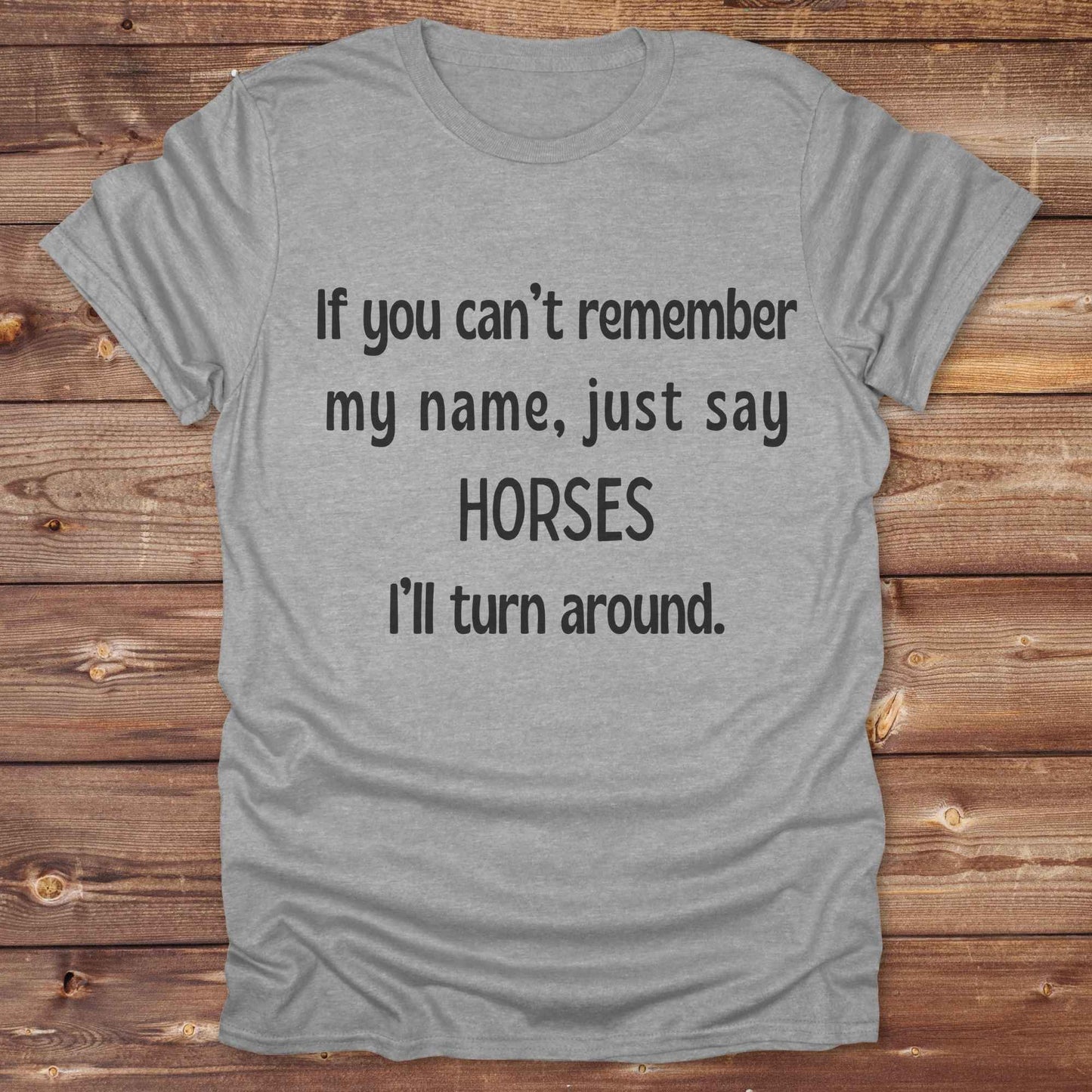 Get noticed with our hilarious “If You Can’t Remember My Name, Shout Horses” t-shirt designed for cowgirls, cowboys, and horse lovers who live for western humor and barn life. This bold, rustic graphic tee is a perfect gift for birthdays, rodeo events, or just showing off your horse obsession. Made for comfort and laughs, it's the ideal shirt for stables, trail rides, and every country concert. Cowgirl up and shout your style loud and proud. From rustic charm to rodeo ready sass, this shirt says it all!