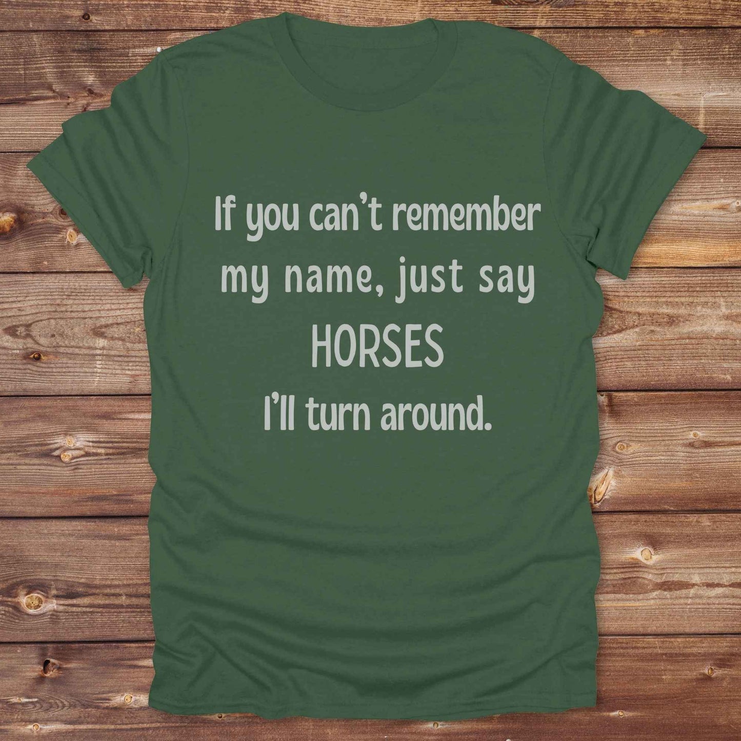 Get noticed with our hilarious “If You Can’t Remember My Name, Shout Horses” t-shirt designed for cowgirls, cowboys, and horse lovers who live for western humor and barn life. This bold, rustic graphic tee is a perfect gift for birthdays, rodeo events, or just showing off your horse obsession. Made for comfort and laughs, it's the ideal shirt for stables, trail rides, and every country concert. Cowgirl up and shout your style loud and proud. From rustic charm to rodeo ready sass, this shirt says it all!