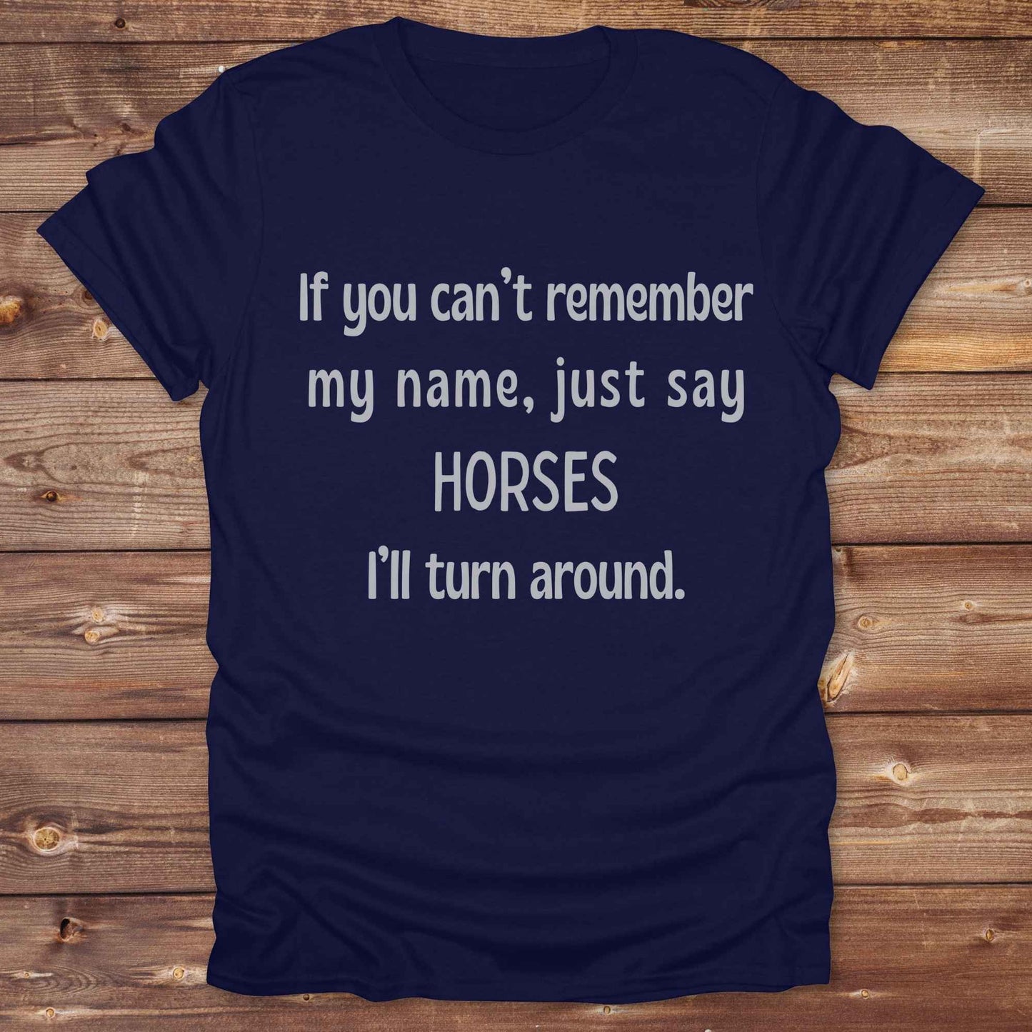 Get noticed with our hilarious “If You Can’t Remember My Name, Shout Horses” t-shirt designed for cowgirls, cowboys, and horse lovers who live for western humor and barn life. This bold, rustic graphic tee is a perfect gift for birthdays, rodeo events, or just showing off your horse obsession. Made for comfort and laughs, it's the ideal shirt for stables, trail rides, and every country concert. Cowgirl up and shout your style loud and proud. From rustic charm to rodeo ready sass, this shirt says it all!