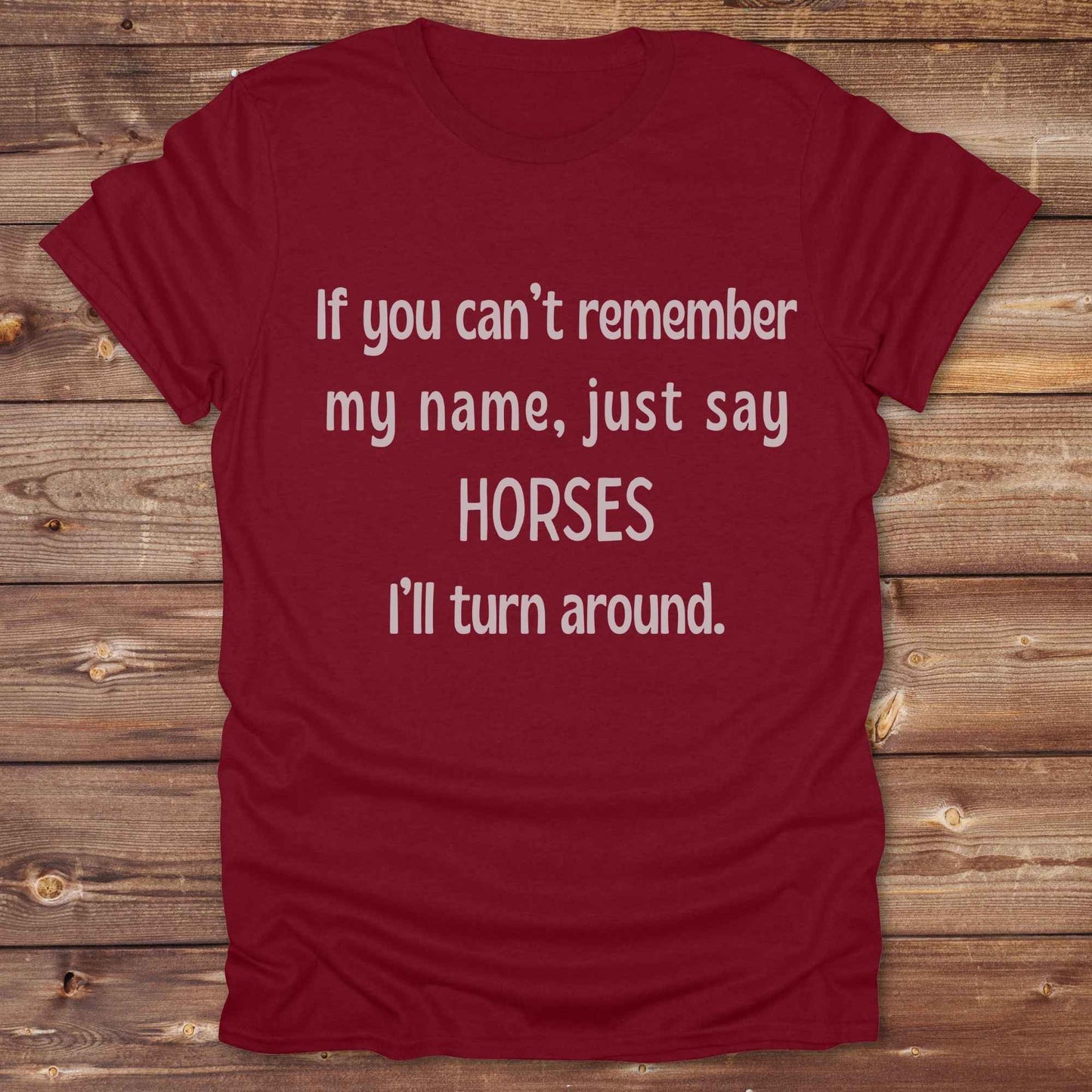 Get noticed with our hilarious “If You Can’t Remember My Name, Shout Horses” t-shirt designed for cowgirls, cowboys, and horse lovers who live for western humor and barn life. This bold, rustic graphic tee is a perfect gift for birthdays, rodeo events, or just showing off your horse obsession. Made for comfort and laughs, it's the ideal shirt for stables, trail rides, and every country concert. Cowgirl up and shout your style loud and proud. From rustic charm to rodeo ready sass, this shirt says it all!