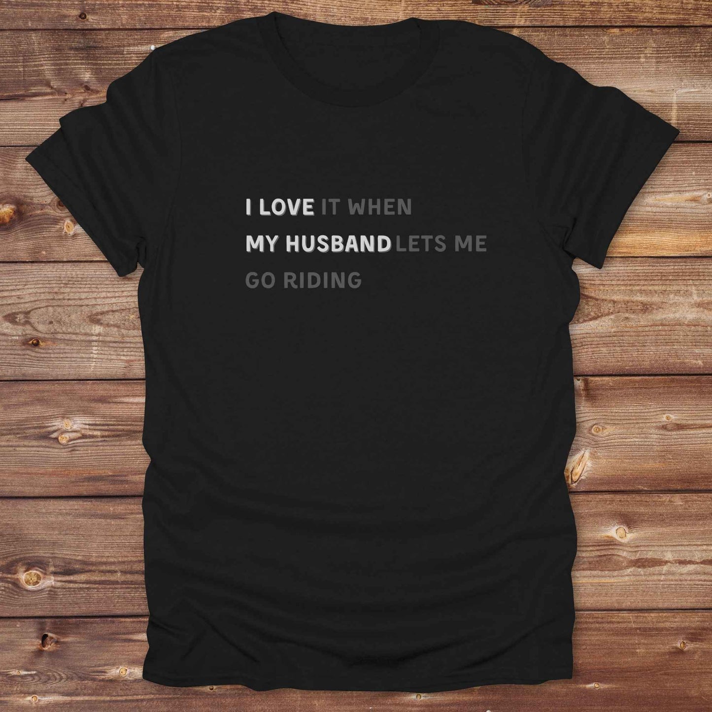 Fun western t-shirt for horse lovers and cowgirls. Western cowgirl graphic tee with horse design. Cowboy humor t-shirt for rodeo and country lovers. Horse lover funny t-shirt with western theme. Country style horse graphic tee for cowboys and cowgirls. Retro style funny western shirt for equestrians. Cute and funny country shirt with horse print. Southern cowgirl funny quote shirt for horse lovers. List of Things I Want. I love my Husband.