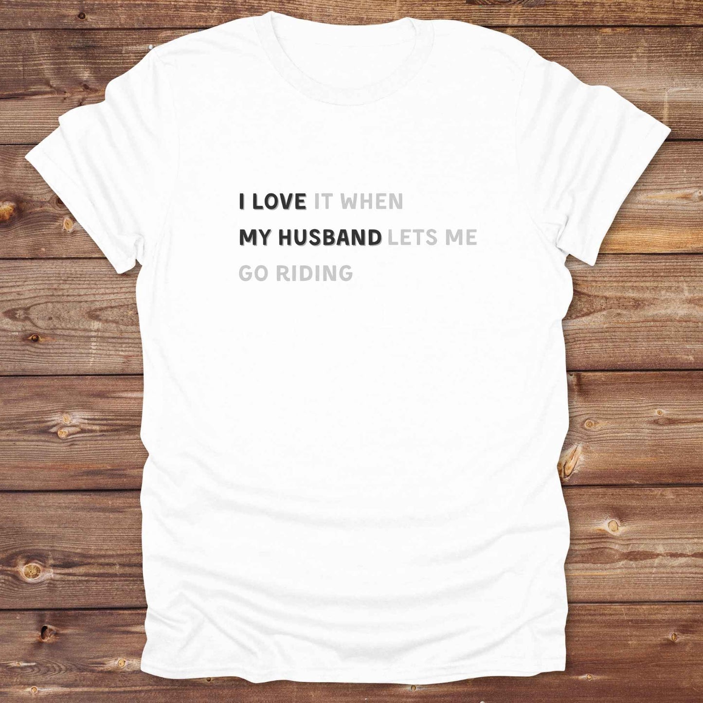 Fun western t-shirt for horse lovers and cowgirls. Western cowgirl graphic tee with horse design. Cowboy humor t-shirt for rodeo and country lovers. Horse lover funny t-shirt with western theme. Country style horse graphic tee for cowboys and cowgirls. Retro style funny western shirt for equestrians. Cute and funny country shirt with horse print. Southern cowgirl funny quote shirt for horse lovers. List of Things I Want. I love my Husband.