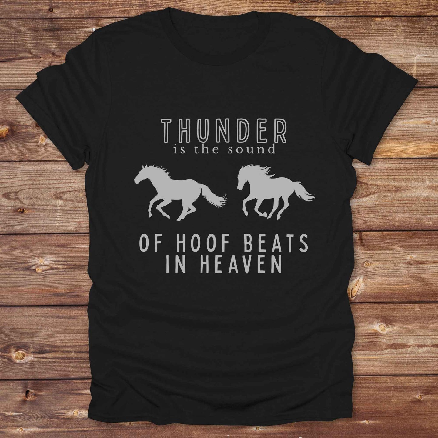 Saddle up with our “Hoof Beats in Heaven” Western Tee – the perfect tribute to your love for horses, riding, and country life. Featuring bold galloping horse graphics and the quote “Thunder is the sound of hoof beats in heaven,” this shirt is made for cowgirls, cowboys, and western soul seekers. Ideal for rodeo lovers, country music fans, and horse memorial gifts. It’s a versatile piece for ranch days, casual outings, or as a thoughtful gift.