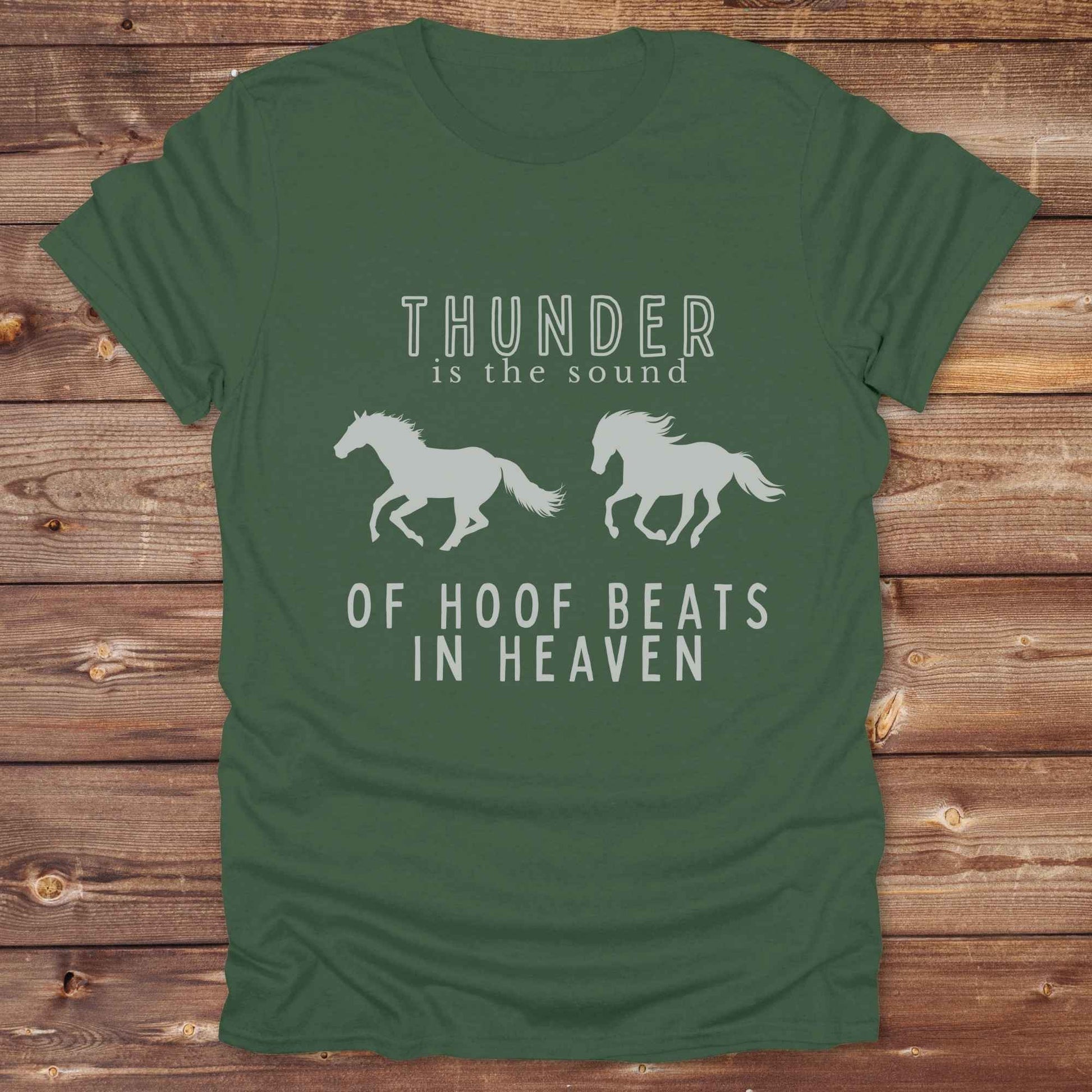 Saddle up with our “Hoof Beats in Heaven” Western Tee – the perfect tribute to your love for horses, riding, and country life. Featuring bold galloping horse graphics and the quote “Thunder is the sound of hoof beats in heaven,” this shirt is made for cowgirls, cowboys, and western soul seekers. Ideal for rodeo lovers, country music fans, and horse memorial gifts. It’s a versatile piece for ranch days, casual outings, or as a thoughtful gift.