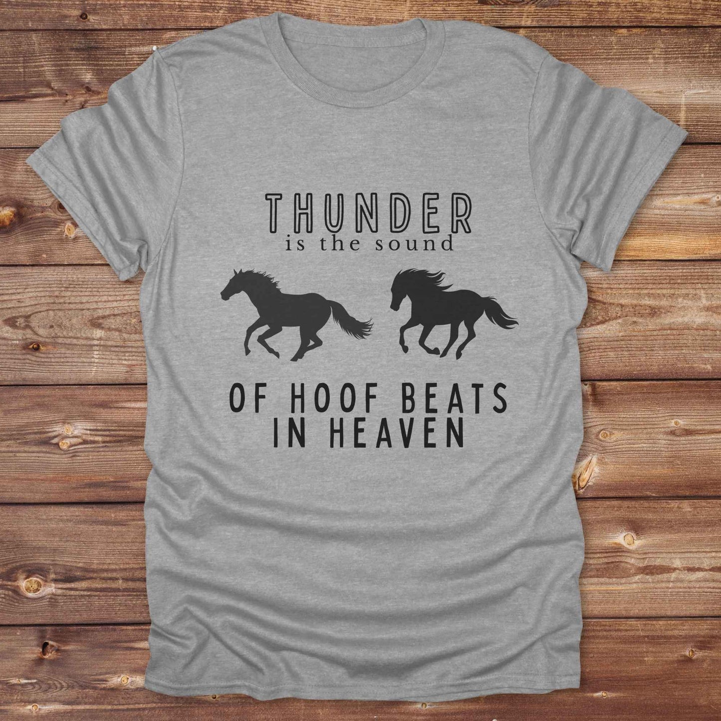 Saddle up with our “Hoof Beats in Heaven” Western Tee – the perfect tribute to your love for horses, riding, and country life. Featuring bold galloping horse graphics and the quote “Thunder is the sound of hoof beats in heaven,” this shirt is made for cowgirls, cowboys, and western soul seekers. Ideal for rodeo lovers, country music fans, and horse memorial gifts. It’s a versatile piece for ranch days, casual outings, or as a thoughtful gift.
