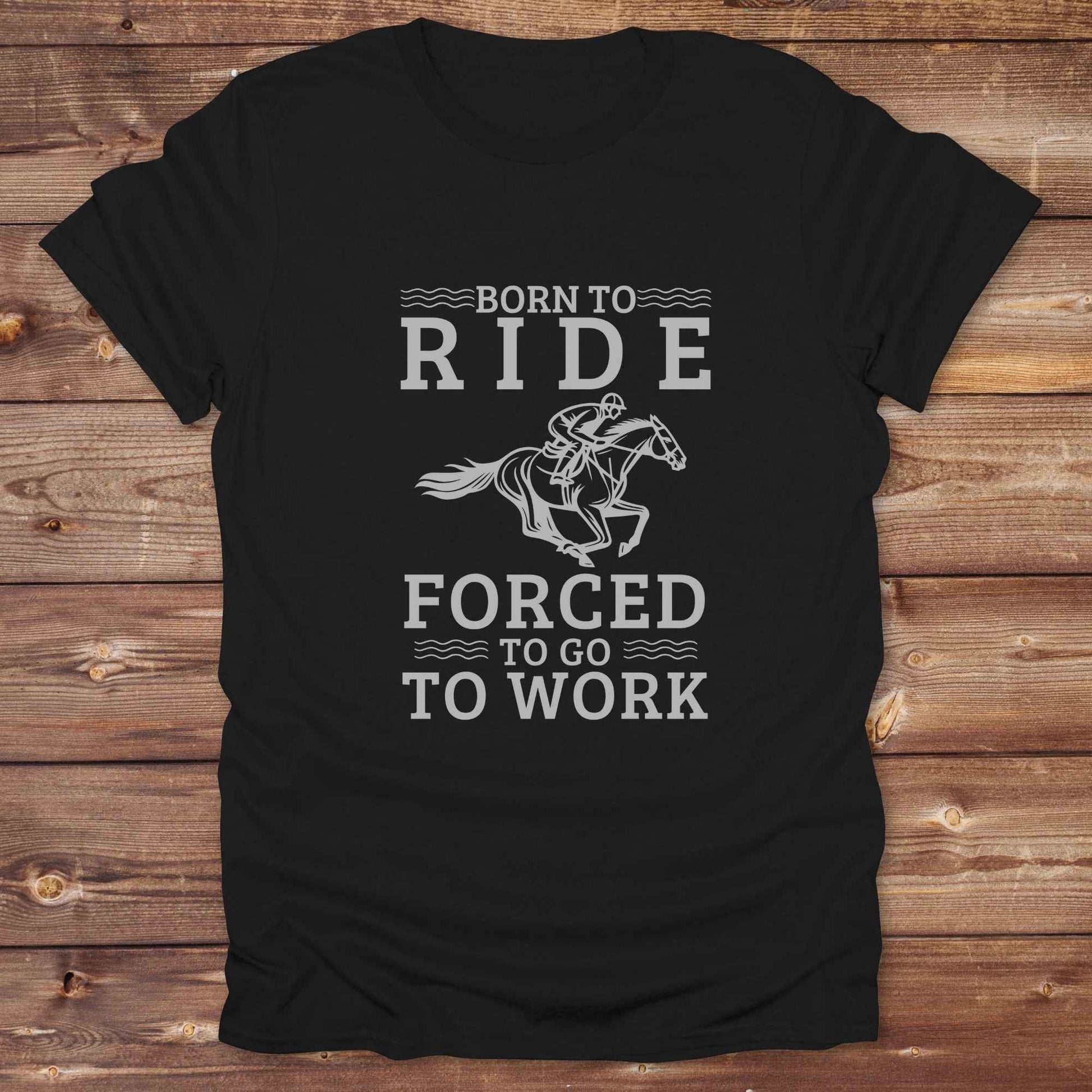 This "Born to Ride, Forced to Go to Work" western t-shirt is perfect for every horse lover who'd rather be riding than reporting to the office. Designed for cowgirls, cowboys, and country soul riders, it blends bold typography with a clean, classic horse graphic. The tee is ideal for rodeo nights, barn life, gifting equestrian moms, or simply expressing your true identity at work.