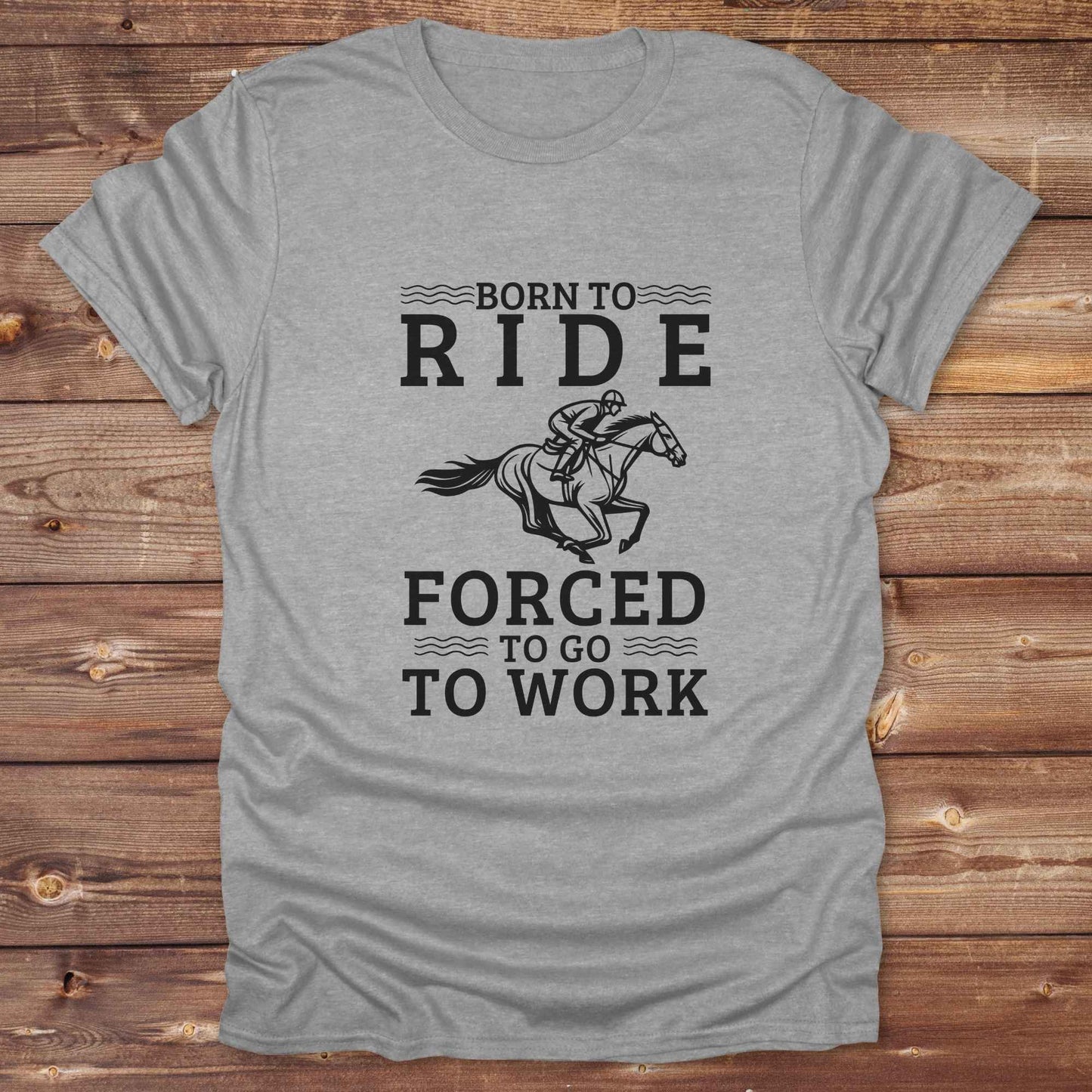 This "Born to Ride, Forced to Go to Work" western t-shirt is perfect for every horse lover who'd rather be riding than reporting to the office. Designed for cowgirls, cowboys, and country soul riders, it blends bold typography with a clean, classic horse graphic. The tee is ideal for rodeo nights, barn life, gifting equestrian moms, or simply expressing your true identity at work.