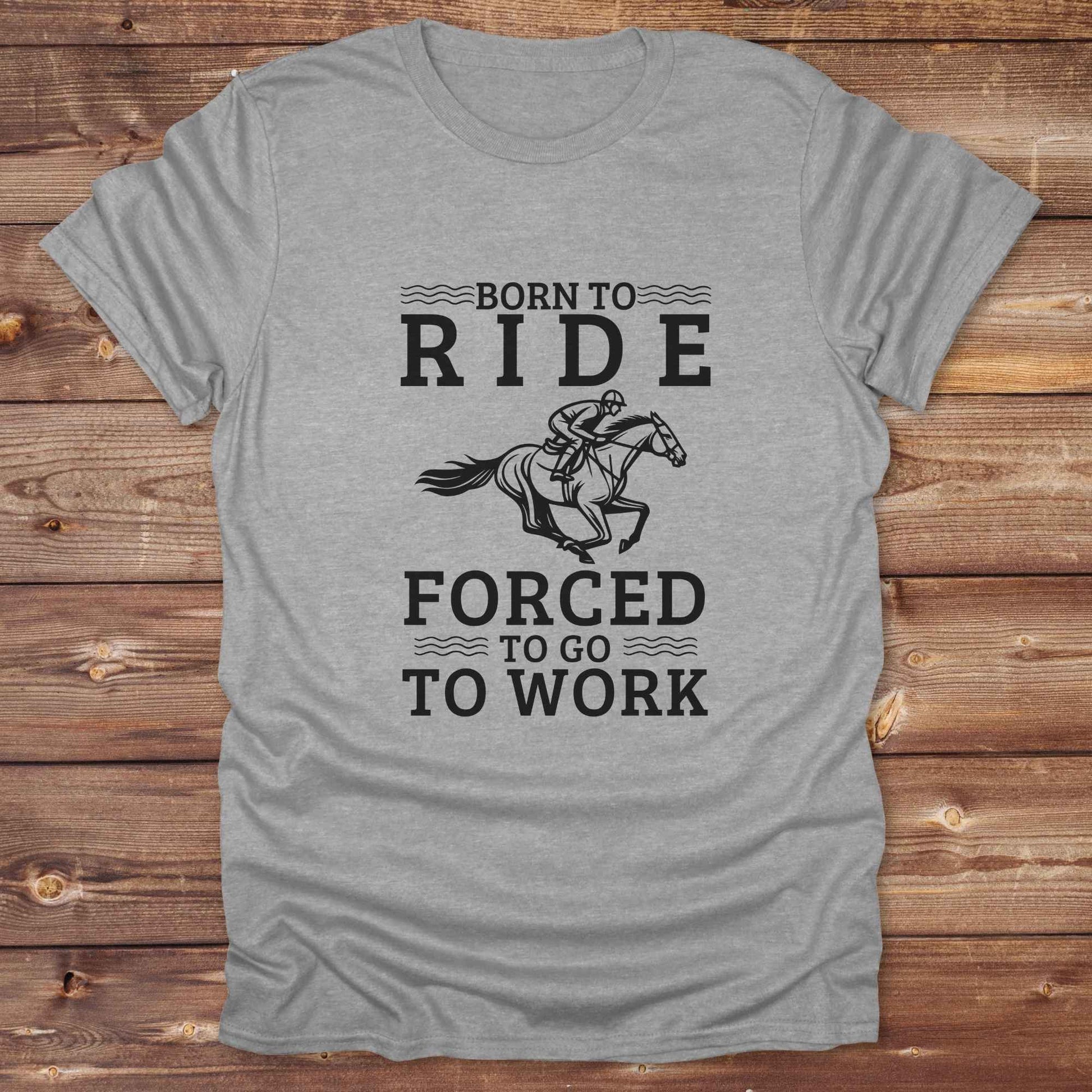 This "Born to Ride, Forced to Go to Work" western t-shirt is perfect for every horse lover who'd rather be riding than reporting to the office. Designed for cowgirls, cowboys, and country soul riders, it blends bold typography with a clean, classic horse graphic. The tee is ideal for rodeo nights, barn life, gifting equestrian moms, or simply expressing your true identity at work.