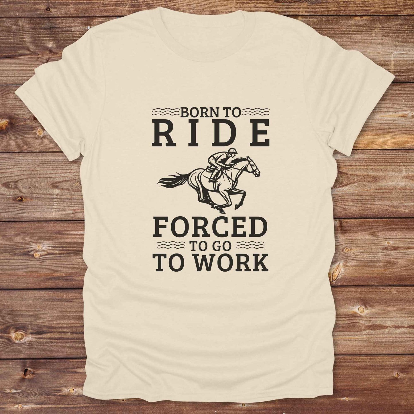 This "Born to Ride, Forced to Go to Work" western t-shirt is perfect for every horse lover who'd rather be riding than reporting to the office. Designed for cowgirls, cowboys, and country soul riders, it blends bold typography with a clean, classic horse graphic. The tee is ideal for rodeo nights, barn life, gifting equestrian moms, or simply expressing your true identity at work.
