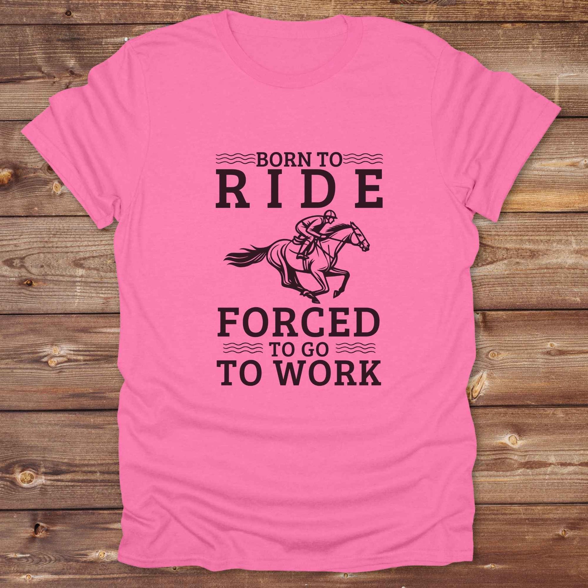 This "Born to Ride, Forced to Go to Work" western t-shirt is perfect for every horse lover who'd rather be riding than reporting to the office. Designed for cowgirls, cowboys, and country soul riders, it blends bold typography with a clean, classic horse graphic. The tee is ideal for rodeo nights, barn life, gifting equestrian moms, or simply expressing your true identity at work.