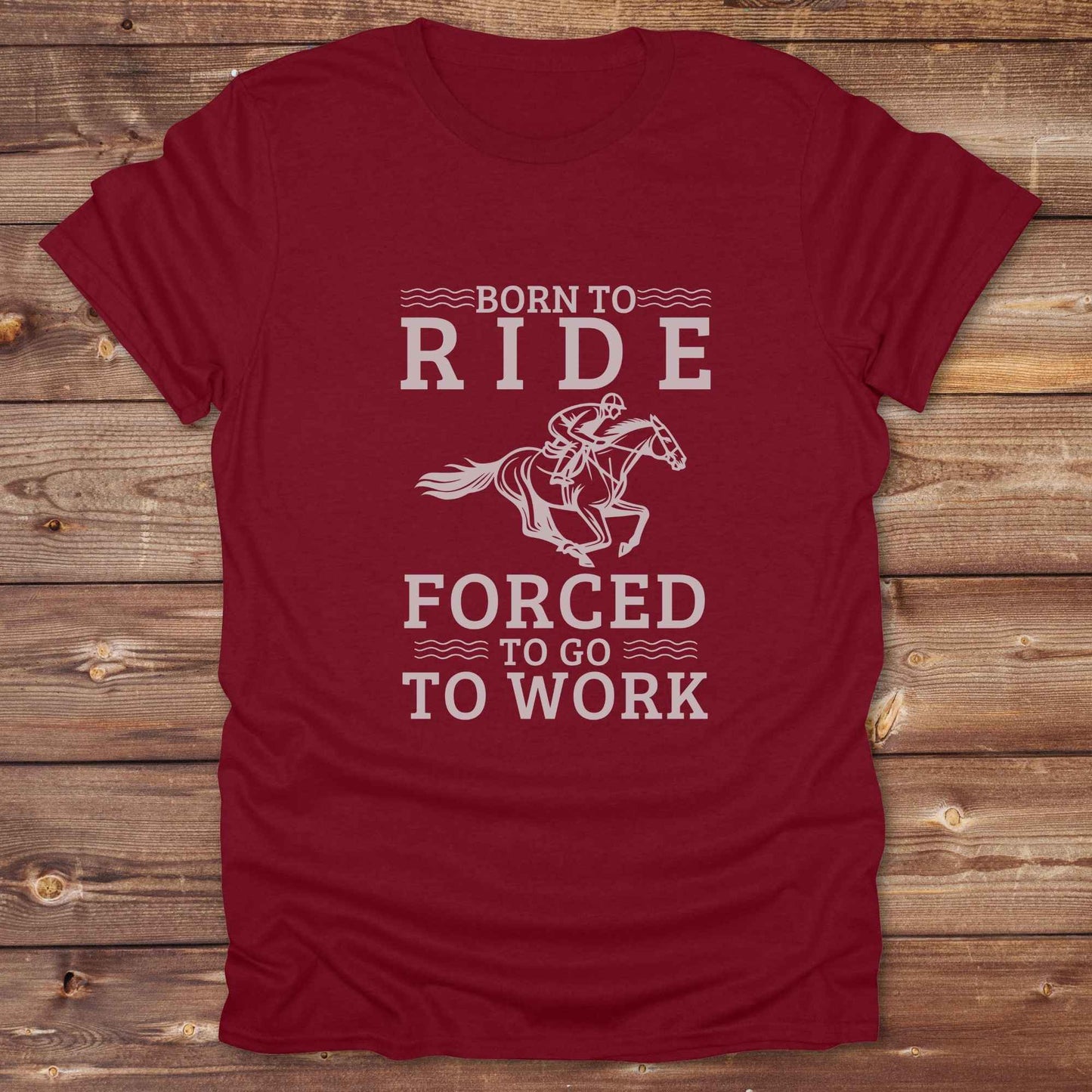 This "Born to Ride, Forced to Go to Work" western t-shirt is perfect for every horse lover who'd rather be riding than reporting to the office. Designed for cowgirls, cowboys, and country soul riders, it blends bold typography with a clean, classic horse graphic. The tee is ideal for rodeo nights, barn life, gifting equestrian moms, or simply expressing your true identity at work.