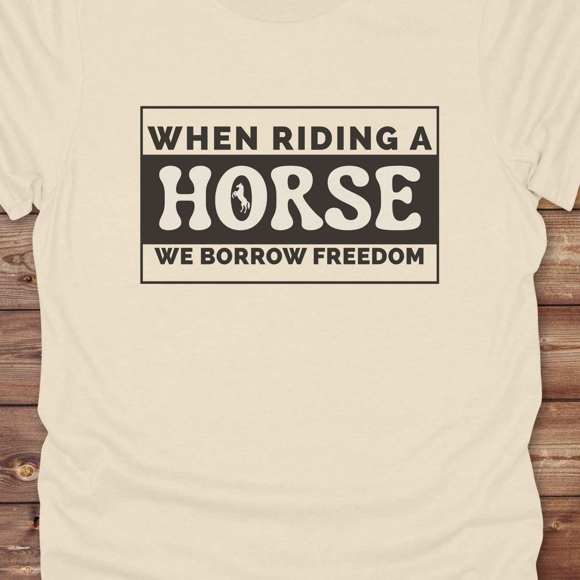 Wear your spirit of freedom with our Borrow Freedom Horse T‑Shirt. Perfect for cowgirls, cowboys, rodeo lovers, and horse enthusiasts, this western graphic tee combines vintage charm with modern comfort. A standout gift idea for birthdays, anniversaries, or just because this unisex horse lover shirt elevates country style while celebrating equestrian passion.