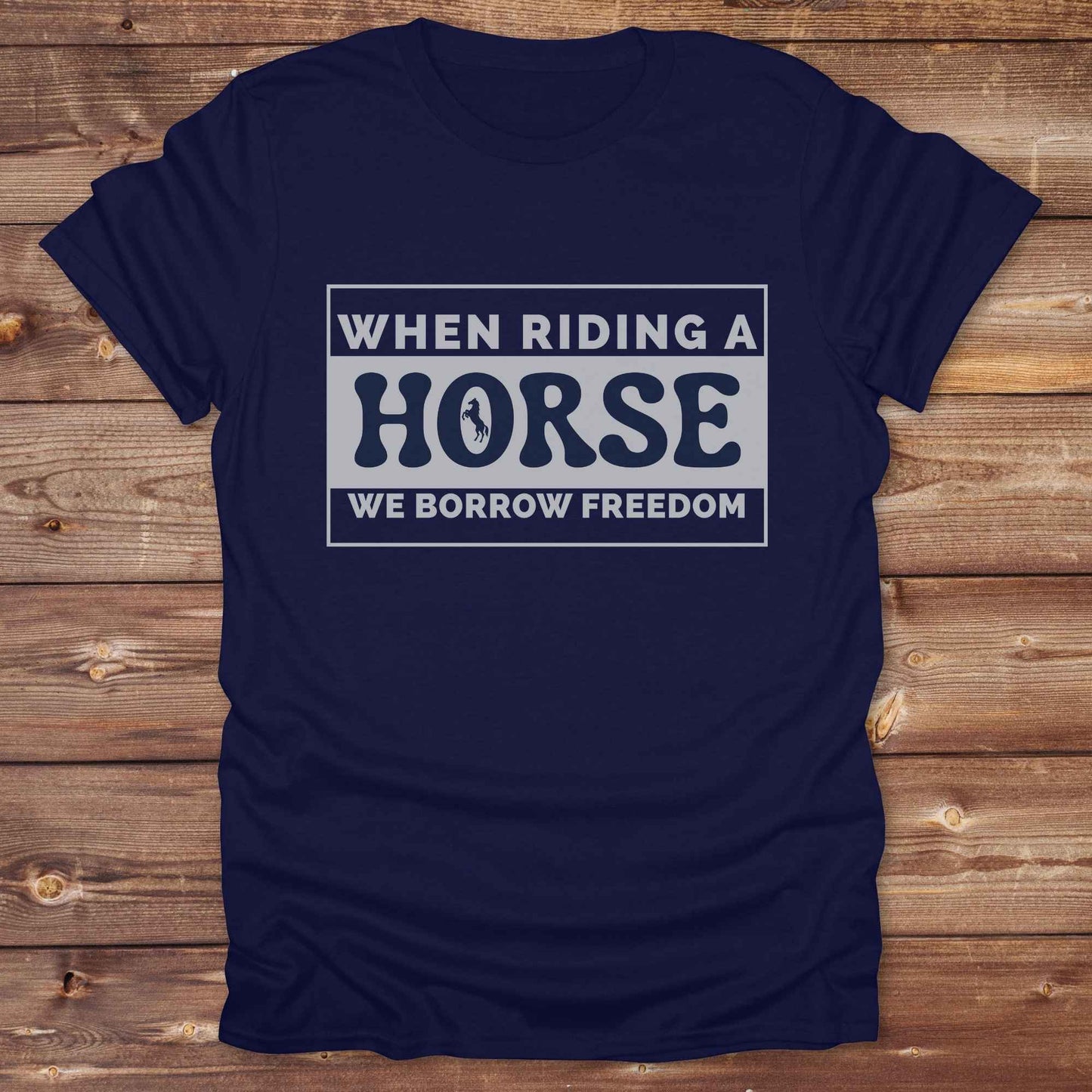 Wear your spirit of freedom with our Borrow Freedom Horse T‑Shirt. Perfect for cowgirls, cowboys, rodeo lovers, and horse enthusiasts, this western graphic tee combines vintage charm with modern comfort. A standout gift idea for birthdays, anniversaries, or just because this unisex horse lover shirt elevates country style while celebrating equestrian passion.