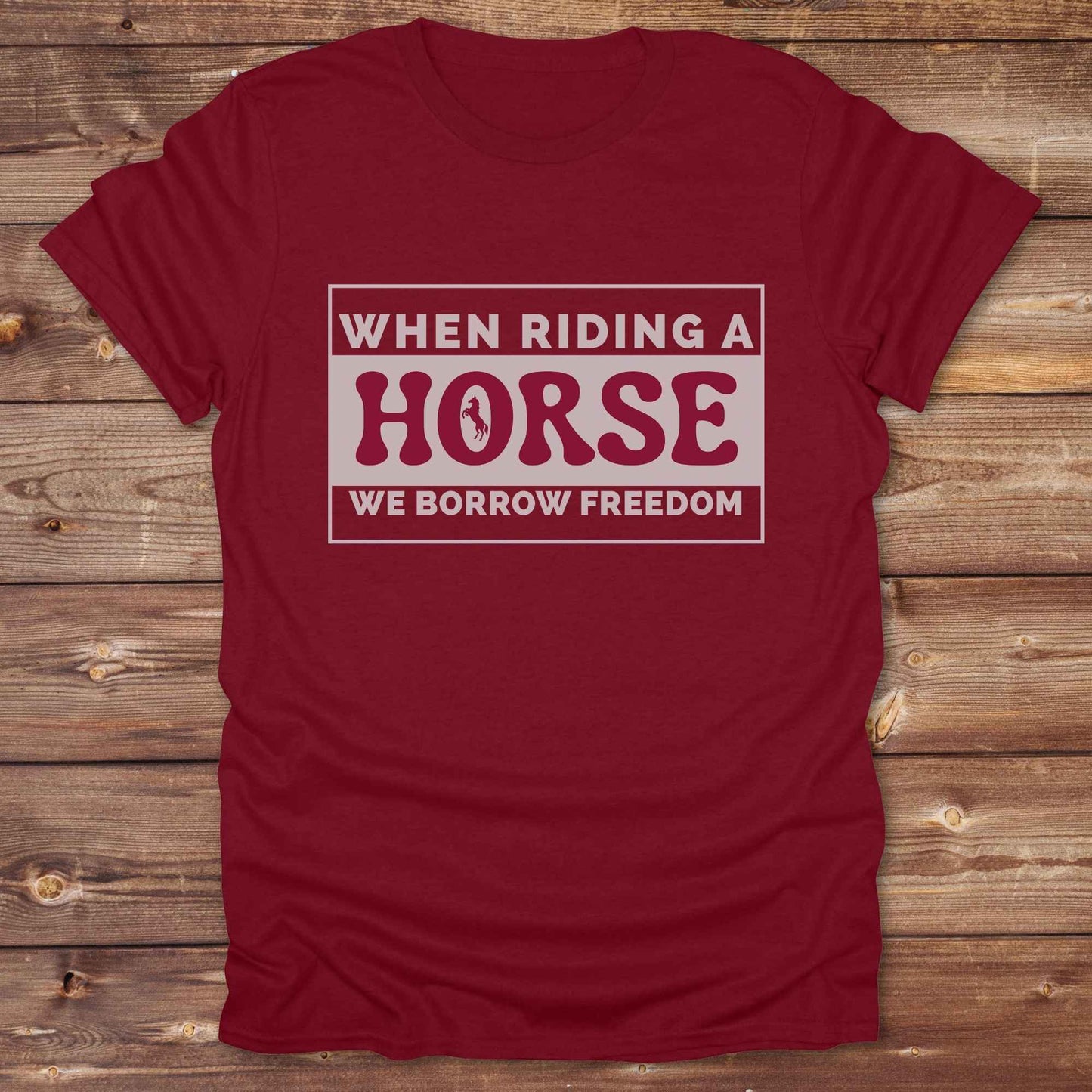 Wear your spirit of freedom with our Borrow Freedom Horse T‑Shirt. Perfect for cowgirls, cowboys, rodeo lovers, and horse enthusiasts, this western graphic tee combines vintage charm with modern comfort. A standout gift idea for birthdays, anniversaries, or just because this unisex horse lover shirt elevates country style while celebrating equestrian passion.
