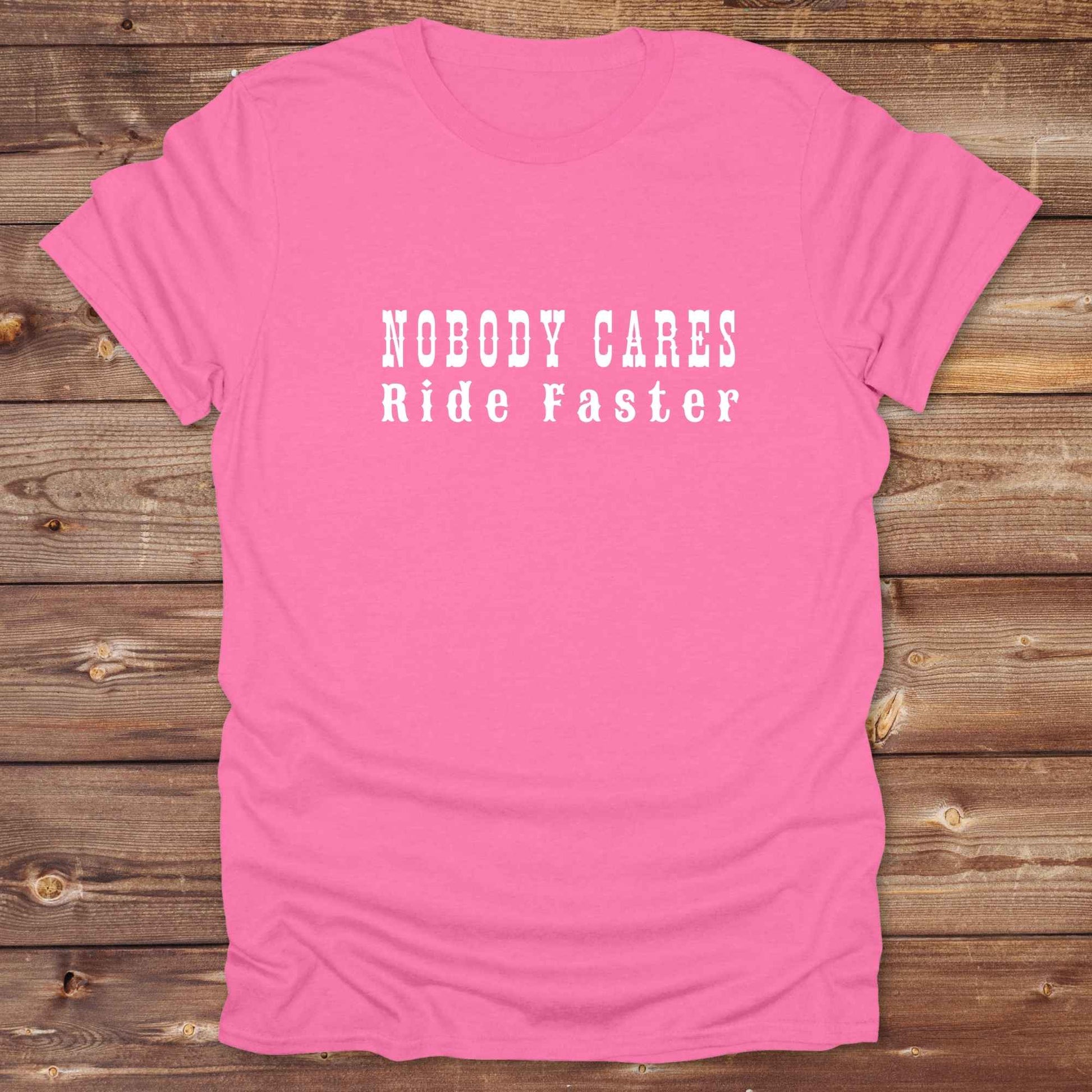 Fun western t-shirt for horse lovers and cowgirls. Western cowgirl graphic tee with horse design. Cowboy humor t-shirt for rodeo and country lovers. Horse lover funny t-shirt with western theme. Country style horse graphic tee for cowboys and cowgirls. Retro style funny western shirt for equestrians. Cute and funny country shirt with horse print. Southern cowgirl funny quote shirt for horse lovers. Nobody cares ride faster.