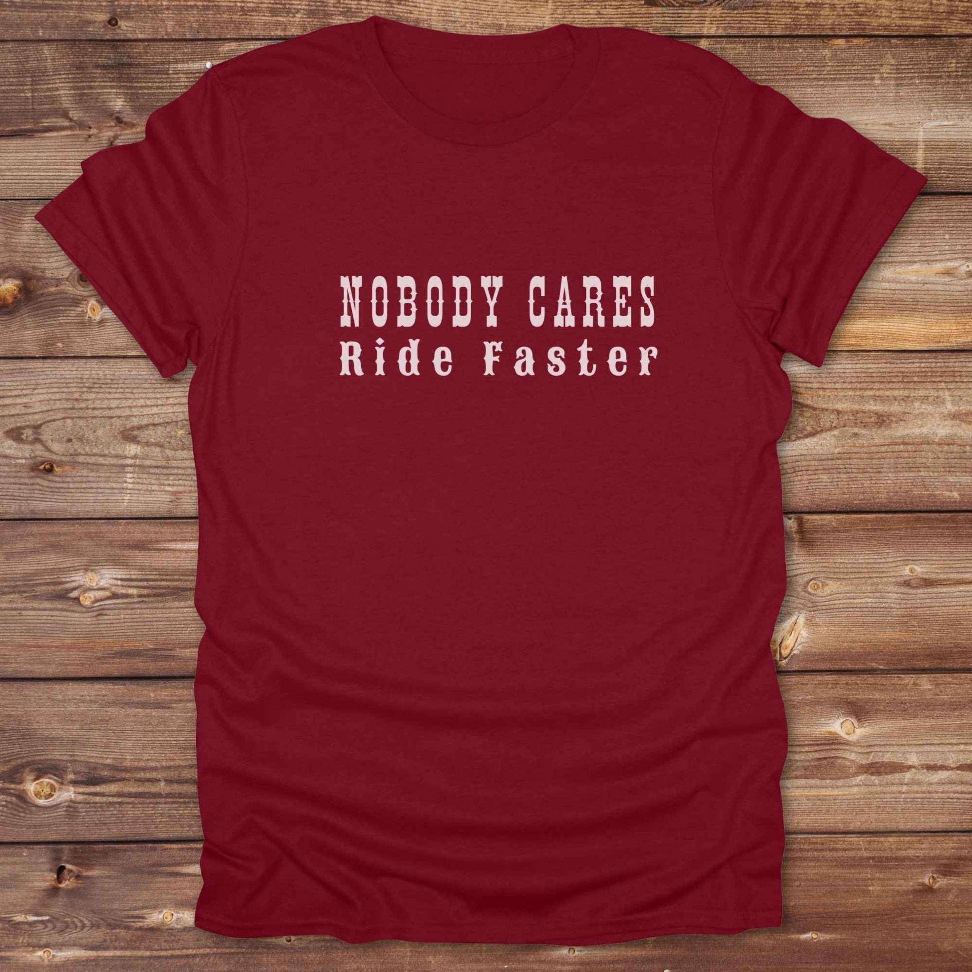 Fun western t-shirt for horse lovers and cowgirls. Western cowgirl graphic tee with horse design. Cowboy humor t-shirt for rodeo and country lovers. Horse lover funny t-shirt with western theme. Country style horse graphic tee for cowboys and cowgirls. Retro style funny western shirt for equestrians. Cute and funny country shirt with horse print. Southern cowgirl funny quote shirt for horse lovers. Nobody cares ride faster.