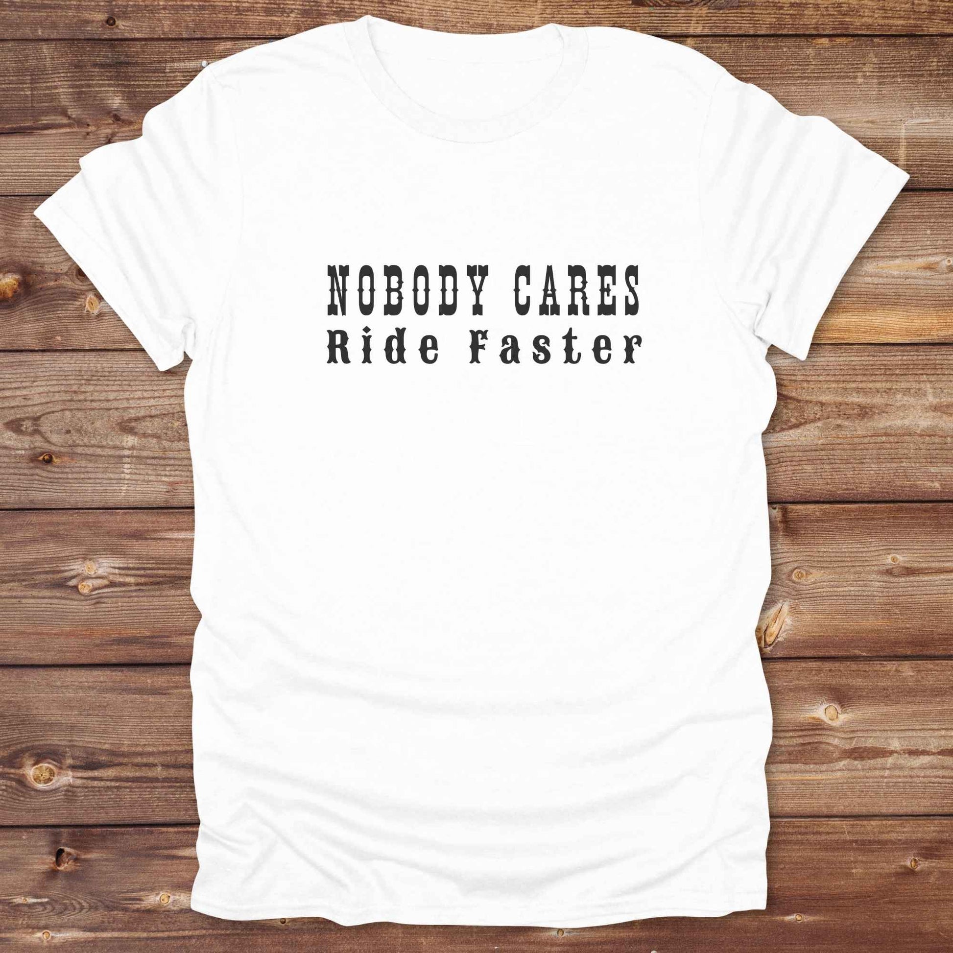 Fun western t-shirt for horse lovers and cowgirls. Western cowgirl graphic tee with horse design. Cowboy humor t-shirt for rodeo and country lovers. Horse lover funny t-shirt with western theme. Country style horse graphic tee for cowboys and cowgirls. Retro style funny western shirt for equestrians. Cute and funny country shirt with horse print. Southern cowgirl funny quote shirt for horse lovers. Nobody cares ride faster.