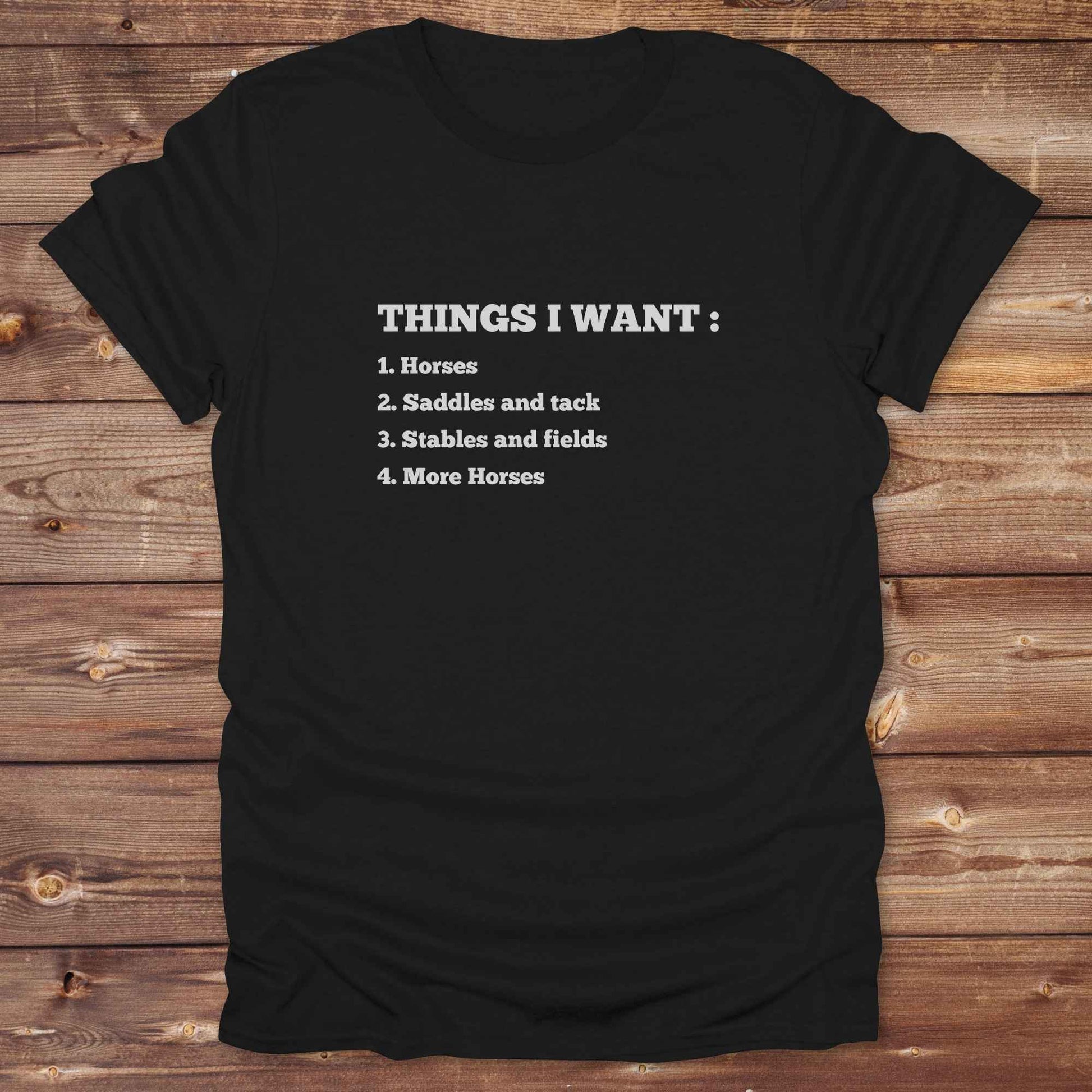 Fun western t-shirt for horse lovers and cowgirls. Western cowgirl graphic tee with horse design. Cowboy humor t-shirt for rodeo and country lovers. Horse lover funny t-shirt with western theme. Country style horse graphic tee for cowboys and cowgirls. Retro style funny western shirt for equestrians. Cute and funny country shirt with horse print. Southern cowgirl funny quote shirt for horse lovers. List of Things I Want.