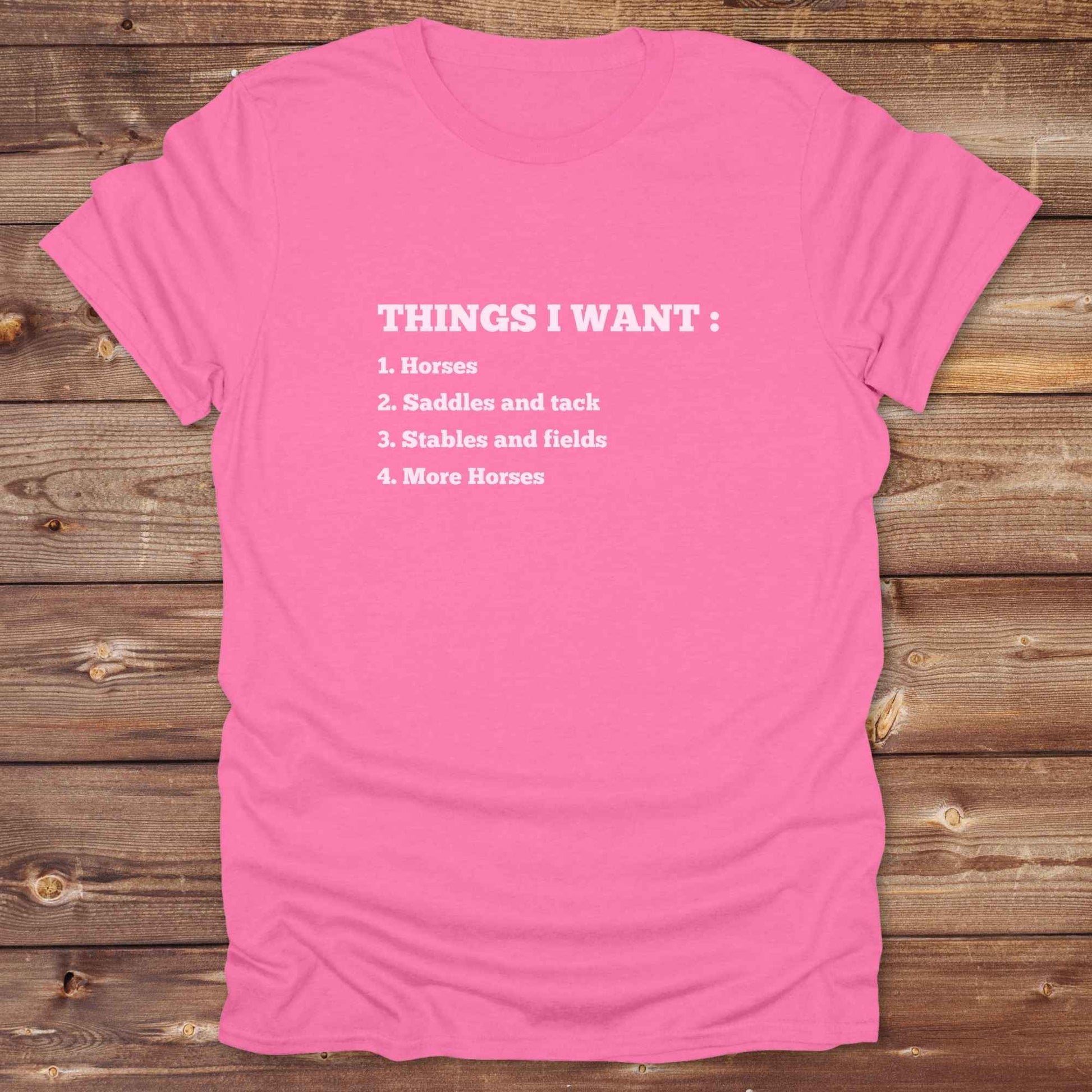 Fun western t-shirt for horse lovers and cowgirls. Western cowgirl graphic tee with horse design. Cowboy humor t-shirt for rodeo and country lovers. Horse lover funny t-shirt with western theme. Country style horse graphic tee for cowboys and cowgirls. Retro style funny western shirt for equestrians. Cute and funny country shirt with horse print. Southern cowgirl funny quote shirt for horse lovers. List of Things I Want.