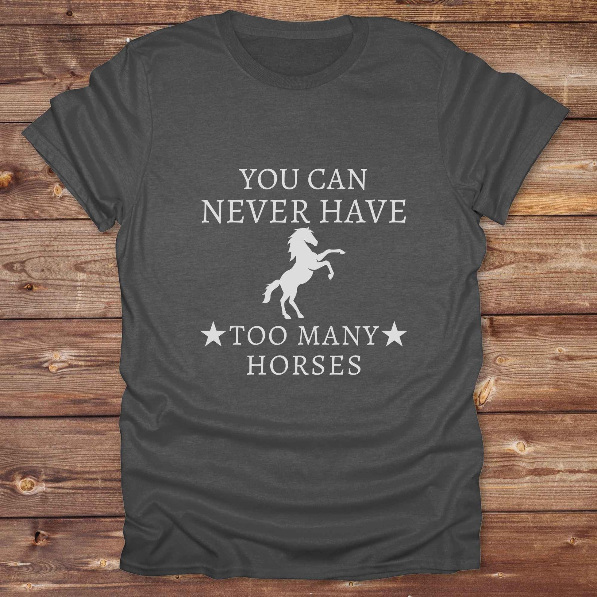 Fun western t-shirt for horse lovers and cowgirls. Western cowgirl graphic tee with horse design. Cowboy humor t-shirt for rodeo and country lovers. Horse lover funny t-shirt with western theme. Country style horse graphic tee for cowboys and cowgirls. Retro style funny western shirt for equestrians. Cute and funny country shirt with horse print. Southern cowgirl funny quote shirt for horse lovers. You can never have too many horses.