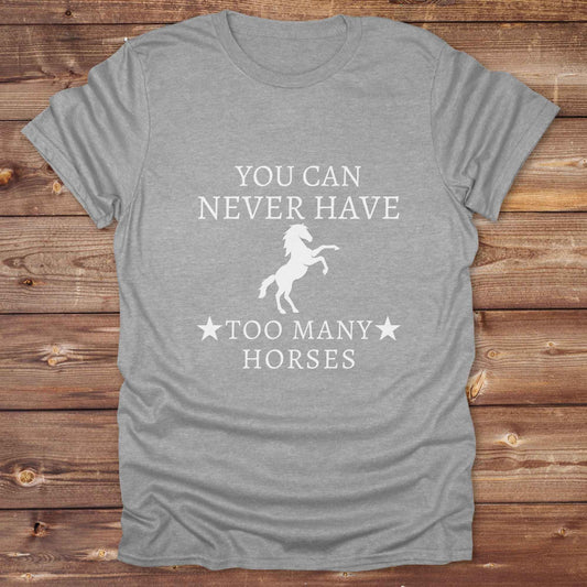 Fun western t-shirt for horse lovers and cowgirls. Western cowgirl graphic tee with horse design. Cowboy humor t-shirt for rodeo and country lovers. Horse lover funny t-shirt with western theme. Country style horse graphic tee for cowboys and cowgirls. Retro style funny western shirt for equestrians. Cute and funny country shirt with horse print. Southern cowgirl funny quote shirt for horse lovers. You can never have too many horses.