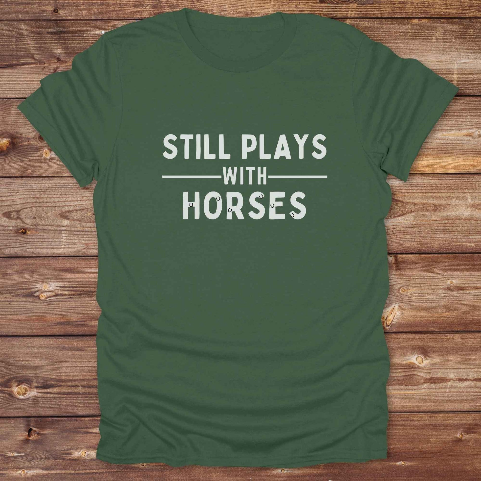 Fun western t-shirt for horse lovers and cowgirls. Western cowgirl graphic tee with horse design. Cowboy humor t-shirt for rodeo and country lovers. Horse lover funny t-shirt with western theme. Country style horse graphic tee for cowboys and cowgirls. Retro style funny western shirt for equestrians. Cute and funny country shirt with horse print. Southern cowgirl funny quote shirt for horse lovers. Still plays with horses.