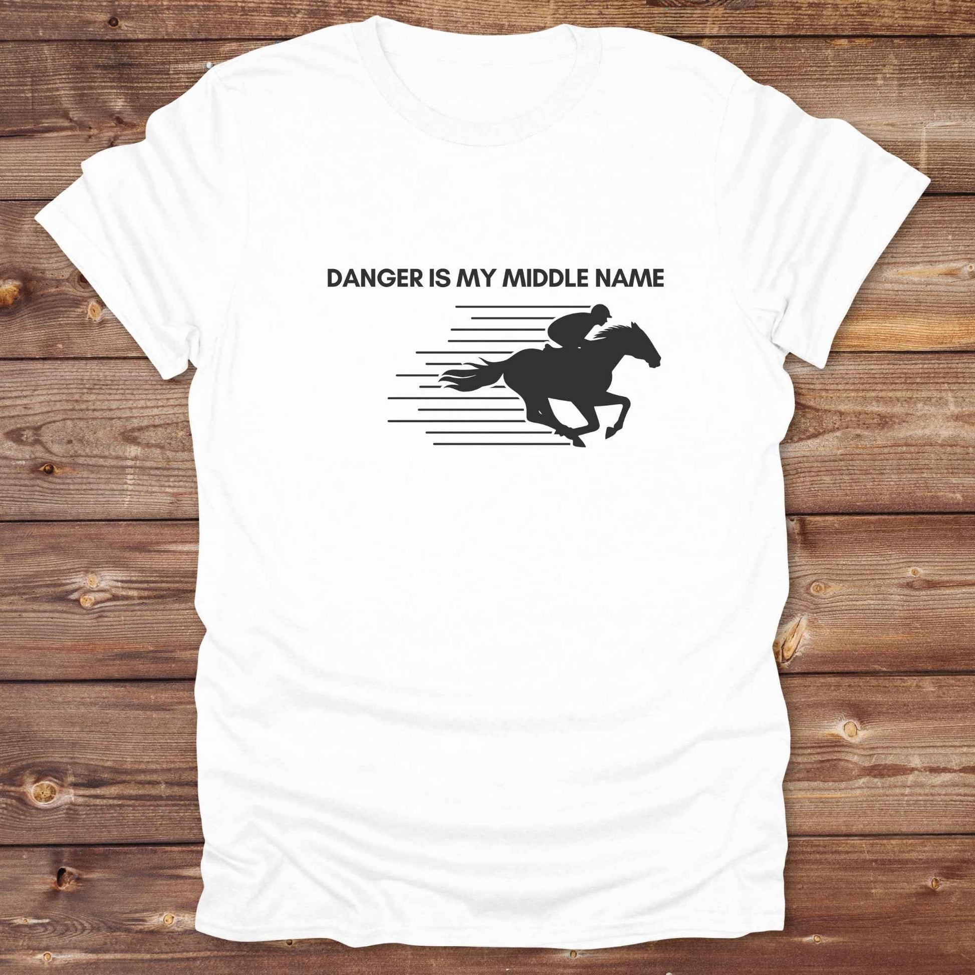 Fun western t-shirt for horse lovers and cowgirls. Western cowgirl graphic tee with horse design. Cowboy humor t-shirt for rodeo and country lovers. Horse lover funny t-shirt with western theme. Country style horse graphic tee for cowboys and cowgirls. Retro style funny western shirt for equestrians. Cute and funny country shirt with horse print. Southern cowgirl funny quote shirt for horse lovers. Danger is my middle name with fast horse.