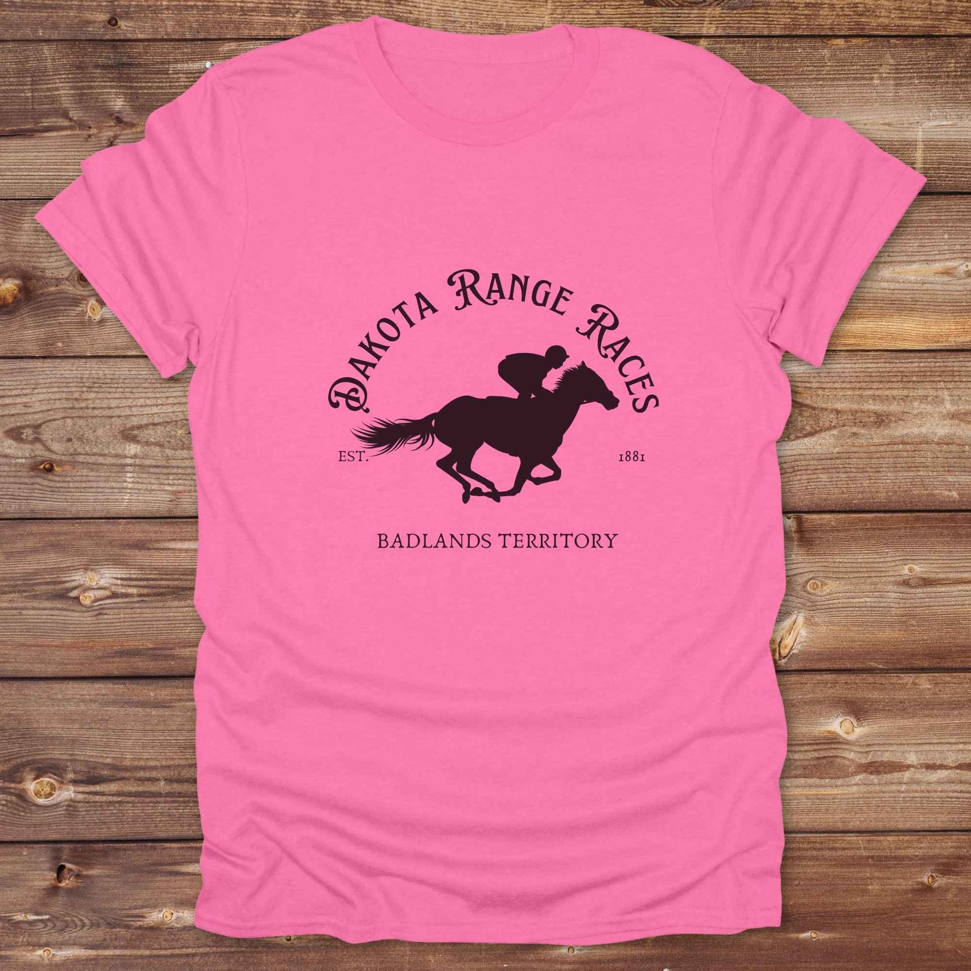 Fun western t-shirt for horse lovers and cowgirls. Western cowgirl graphic tee with horse design. Cowboy humor t-shirt for rodeo and country lovers. Horse lover funny t-shirt with western theme. Country style horse graphic tee for cowboys and cowgirls. Retro style funny western shirt for equestrians. Cute and funny country shirt with horse print. Southern cowgirl funny quote shirt for horse lovers. Dakota Range Races Badlands Territory.