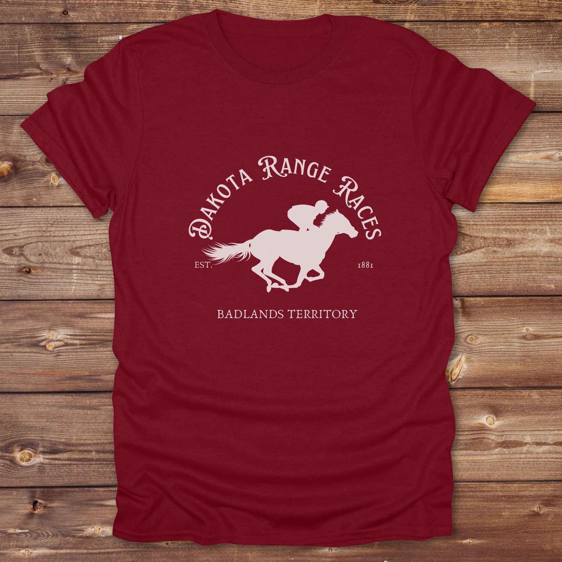 Fun western t-shirt for horse lovers and cowgirls. Western cowgirl graphic tee with horse design. Cowboy humor t-shirt for rodeo and country lovers. Horse lover funny t-shirt with western theme. Country style horse graphic tee for cowboys and cowgirls. Retro style funny western shirt for equestrians. Cute and funny country shirt with horse print. Southern cowgirl funny quote shirt for horse lovers. Dakota Range Races Badlands Territory.