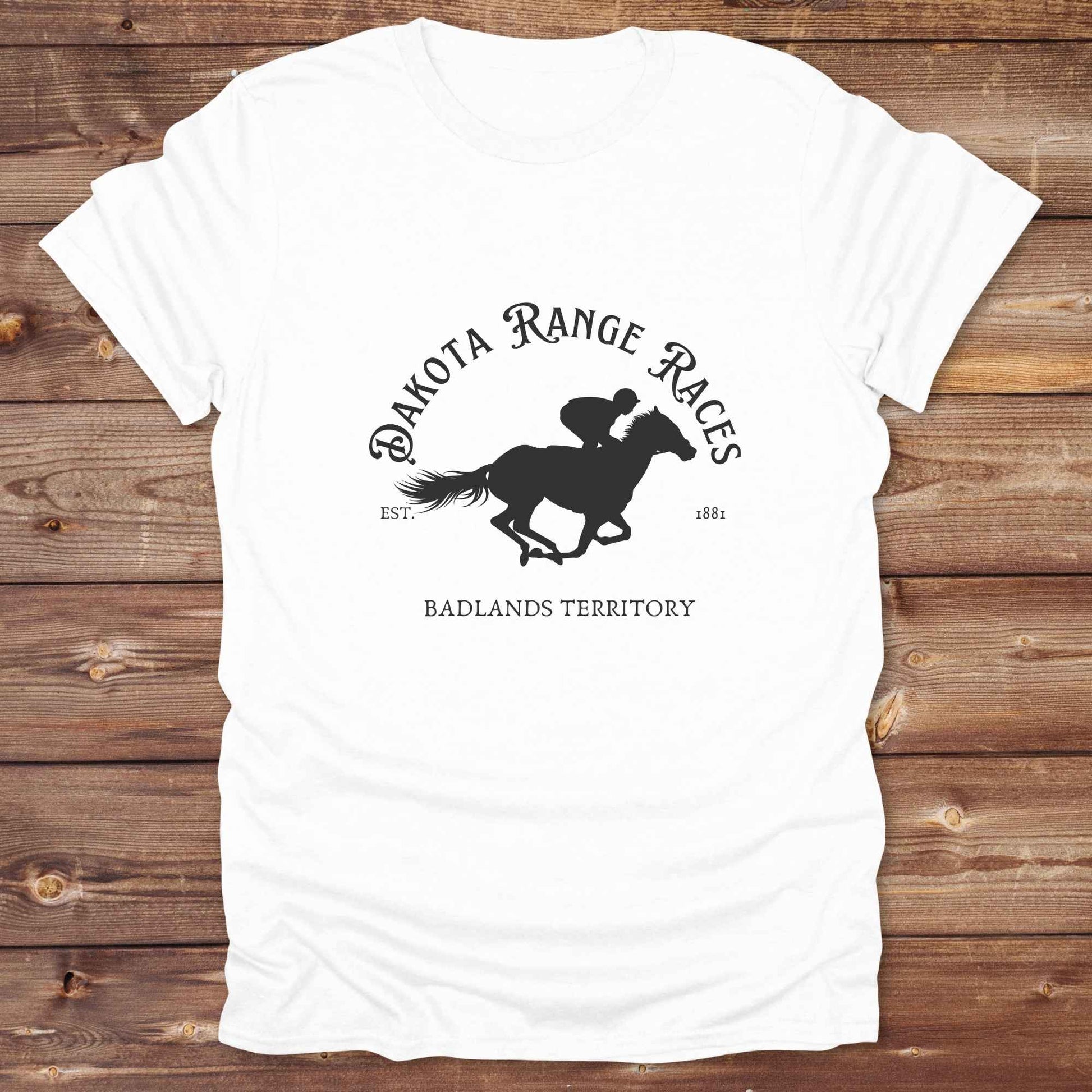 Fun western t-shirt for horse lovers and cowgirls. Western cowgirl graphic tee with horse design. Cowboy humor t-shirt for rodeo and country lovers. Horse lover funny t-shirt with western theme. Country style horse graphic tee for cowboys and cowgirls. Retro style funny western shirt for equestrians. Cute and funny country shirt with horse print. Southern cowgirl funny quote shirt for horse lovers. Dakota Range Races Badlands Territory.