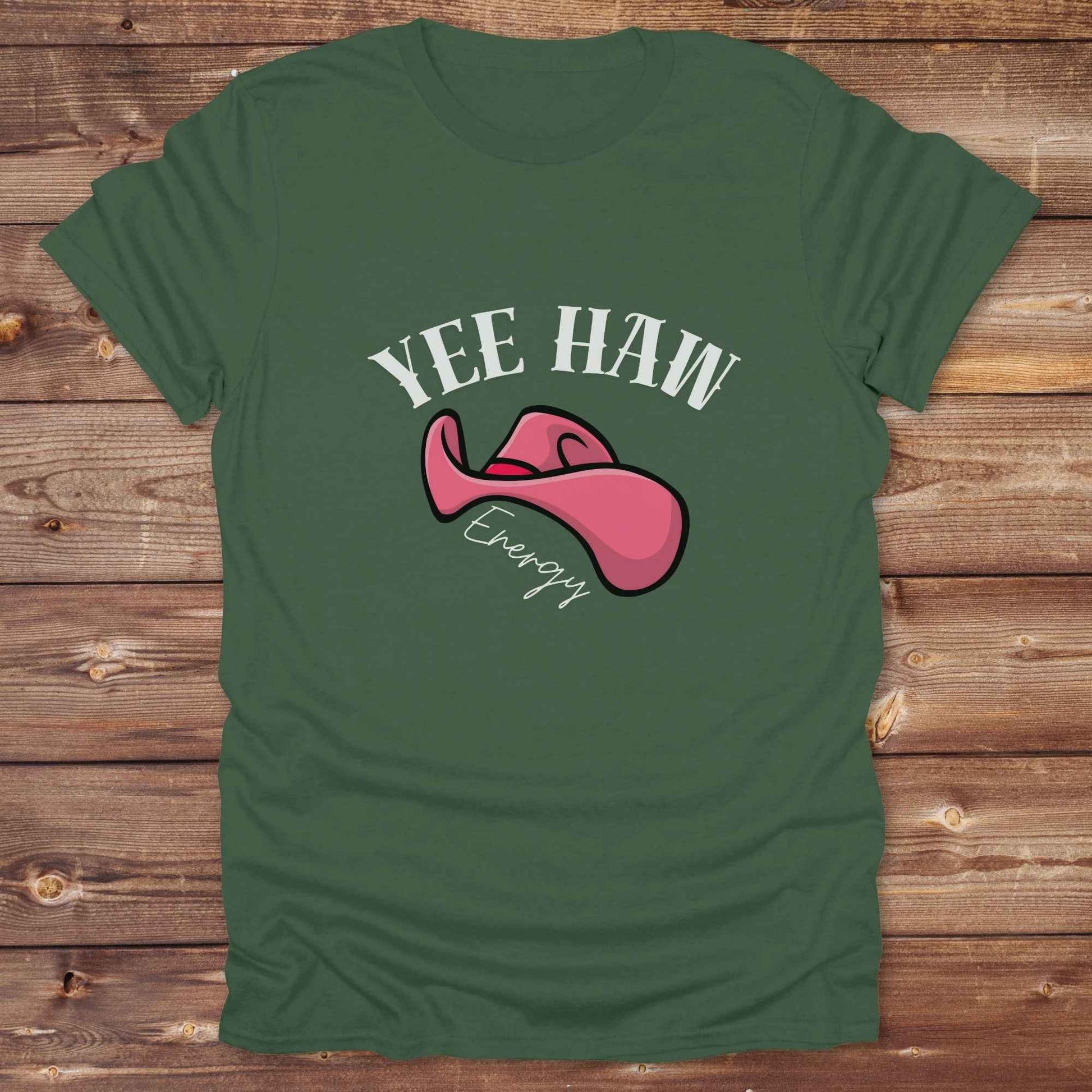 Fun western t-shirt for horse lovers and cowgirls. Western cowgirl graphic tee with horse design. Cowboy humor t-shirt for rodeo and country lovers. Horse lover funny t-shirt with western theme. Country style horse graphic tee for cowboys and cowgirls. Retro style funny western shirt for equestrians. Cute and funny country shirt with horse print. Southern cowgirl funny quote shirt for horse lovers. Yee Haw Energy with Pink Cowgirl Hat.