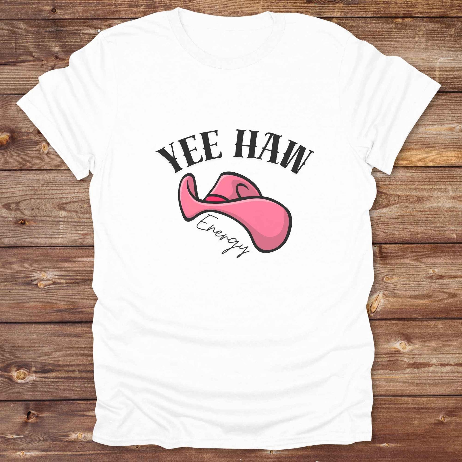 Fun western t-shirt for horse lovers and cowgirls. Western cowgirl graphic tee with horse design. Cowboy humor t-shirt for rodeo and country lovers. Horse lover funny t-shirt with western theme. Country style horse graphic tee for cowboys and cowgirls. Retro style funny western shirt for equestrians. Cute and funny country shirt with horse print. Southern cowgirl funny quote shirt for horse lovers. Yee Haw Energy with Pink Cowgirl Hat.