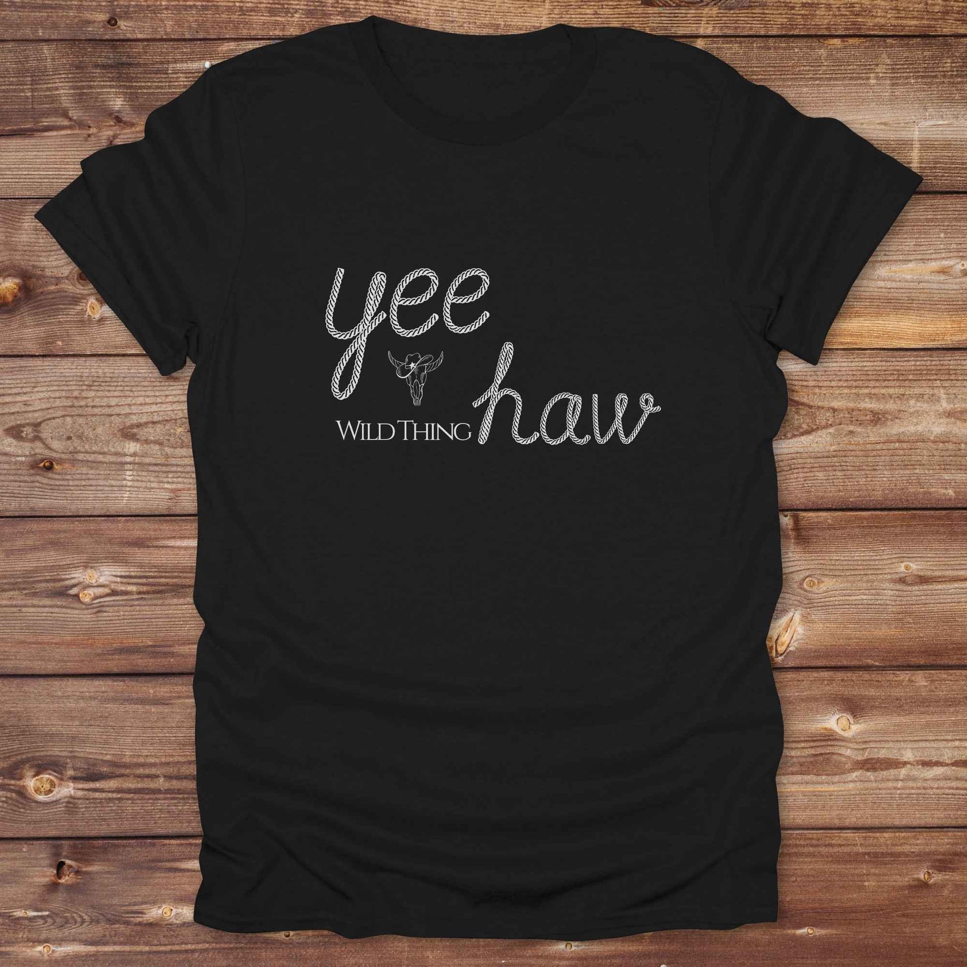 Fun western t-shirt for horse lovers and cowgirls. Western cowgirl graphic tee with horse design. Cowboy humor t-shirt for rodeo and country lovers. Horse lover funny t-shirt with western theme. Country style horse graphic tee for cowboys and cowgirls. Retro style funny western shirt for equestrians. Cute and funny country shirt with horse print. Southern cowgirl funny quote shirt for horse lovers. Yee Haw wild thing.