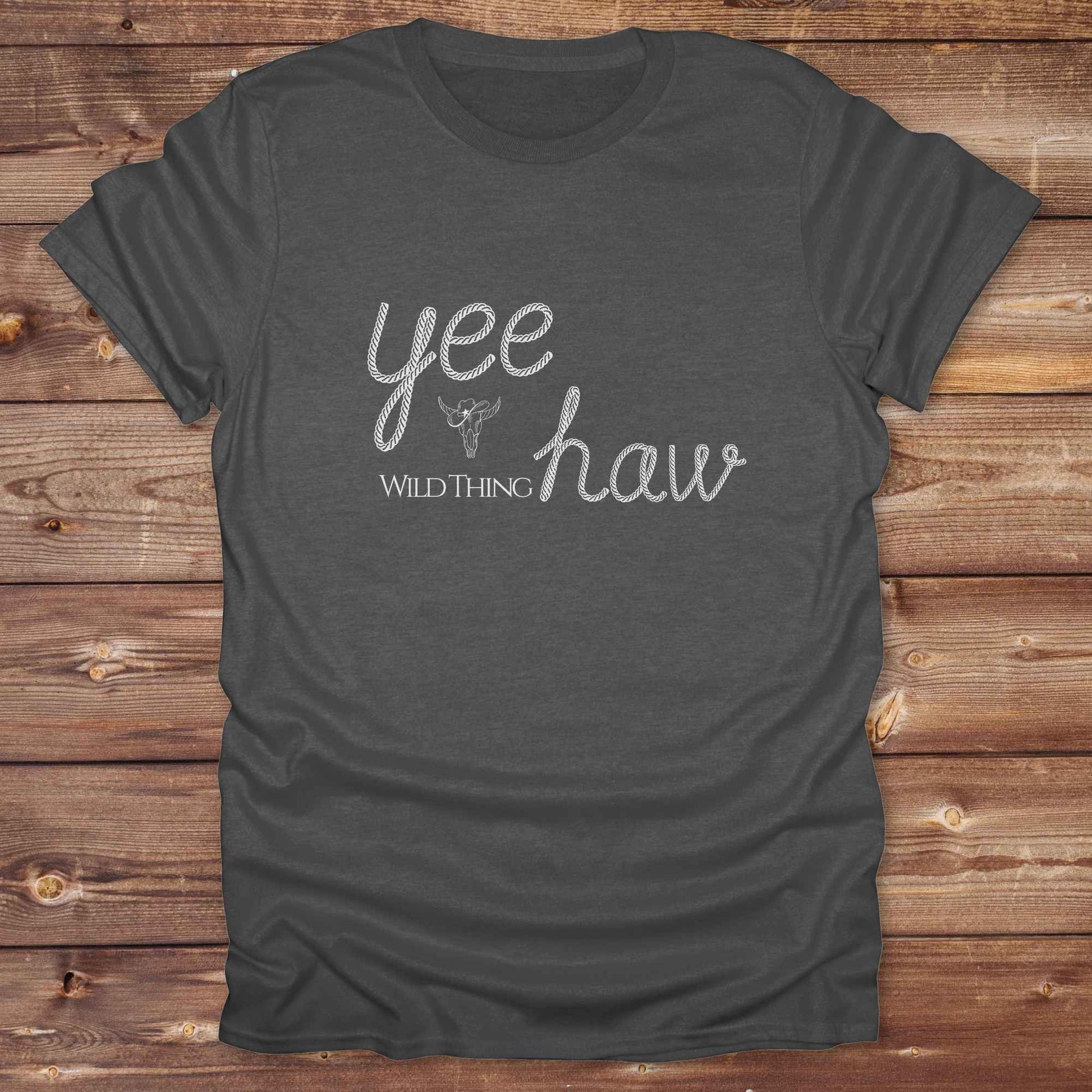 Fun western t-shirt for horse lovers and cowgirls. Western cowgirl graphic tee with horse design. Cowboy humor t-shirt for rodeo and country lovers. Horse lover funny t-shirt with western theme. Country style horse graphic tee for cowboys and cowgirls. Retro style funny western shirt for equestrians. Cute and funny country shirt with horse print. Southern cowgirl funny quote shirt for horse lovers. Yee Haw wild thing.