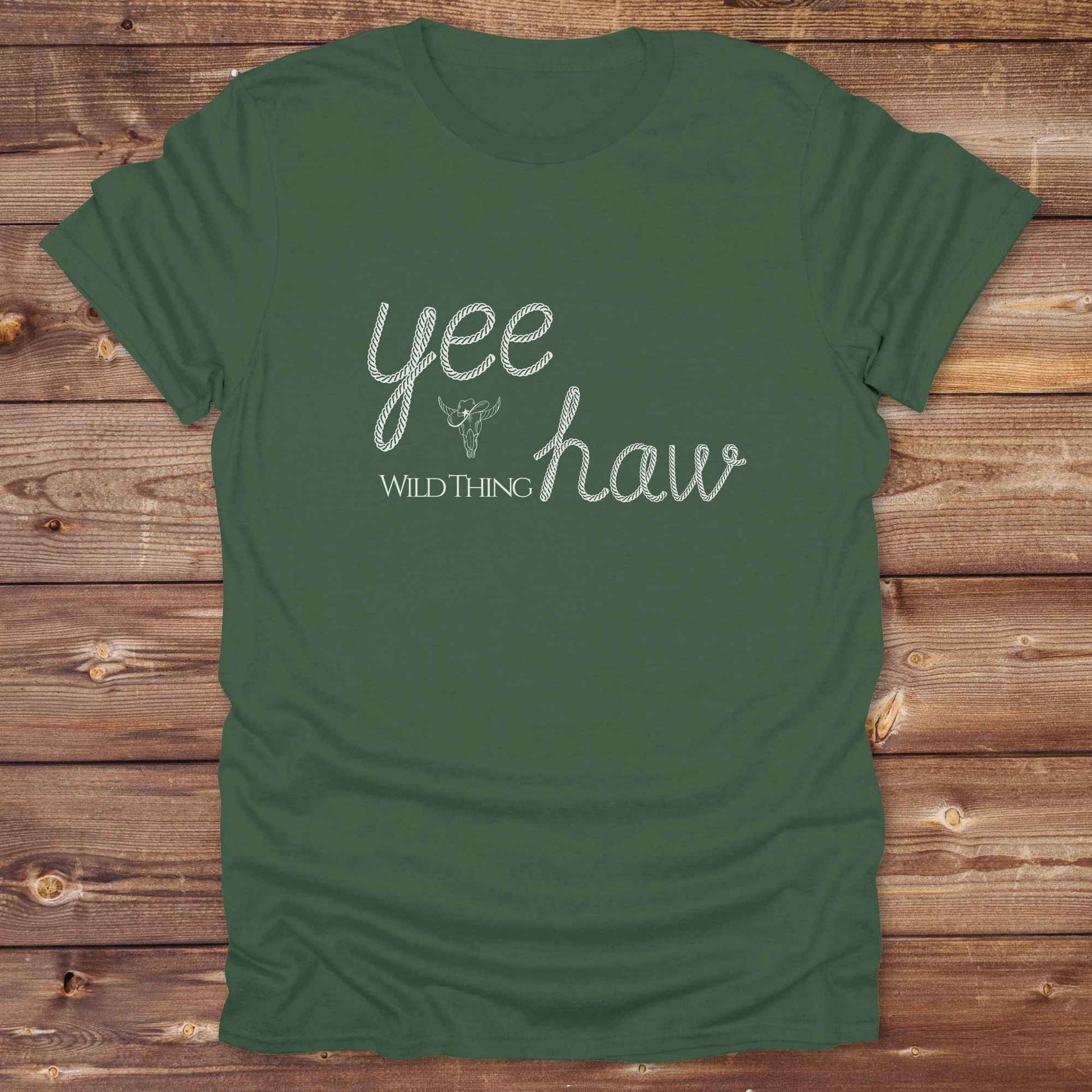 Fun western t-shirt for horse lovers and cowgirls. Western cowgirl graphic tee with horse design. Cowboy humor t-shirt for rodeo and country lovers. Horse lover funny t-shirt with western theme. Country style horse graphic tee for cowboys and cowgirls. Retro style funny western shirt for equestrians. Cute and funny country shirt with horse print. Southern cowgirl funny quote shirt for horse lovers. Yee Haw wild thing.