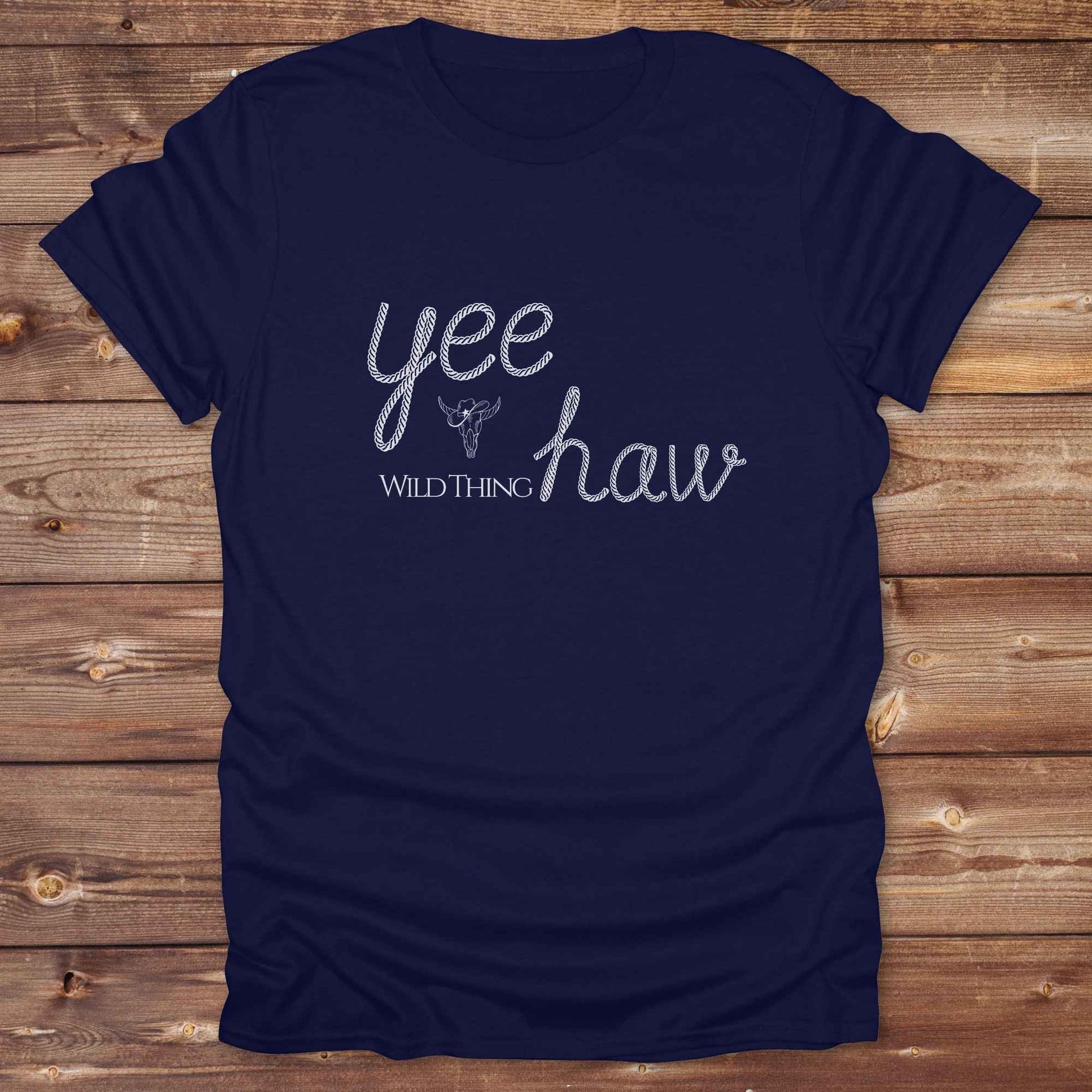 Fun western t-shirt for horse lovers and cowgirls. Western cowgirl graphic tee with horse design. Cowboy humor t-shirt for rodeo and country lovers. Horse lover funny t-shirt with western theme. Country style horse graphic tee for cowboys and cowgirls. Retro style funny western shirt for equestrians. Cute and funny country shirt with horse print. Southern cowgirl funny quote shirt for horse lovers. Yee Haw wild thing.